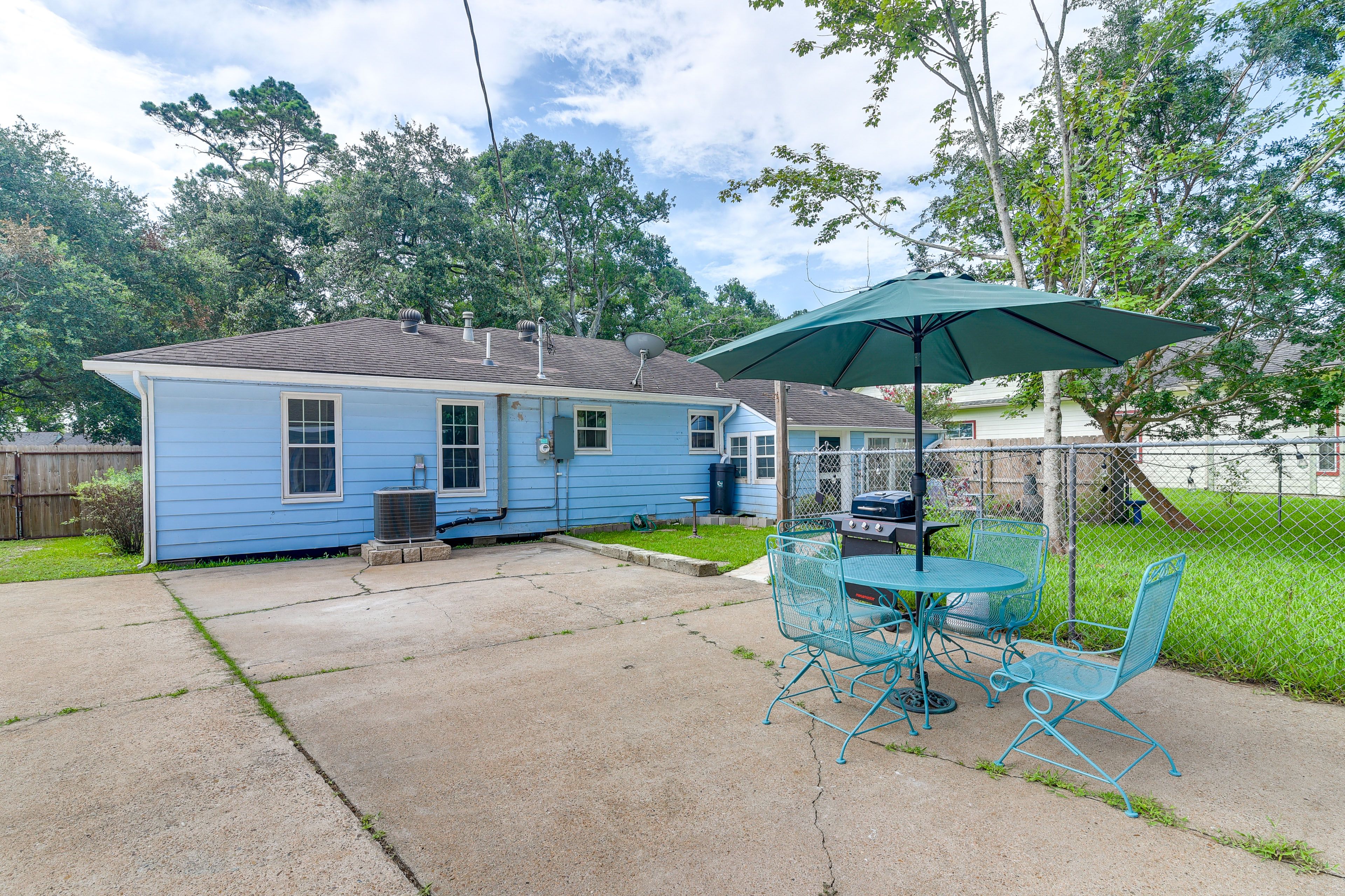 Exterior | Driveway (3 Vehicles) | Patio | Gas Grill