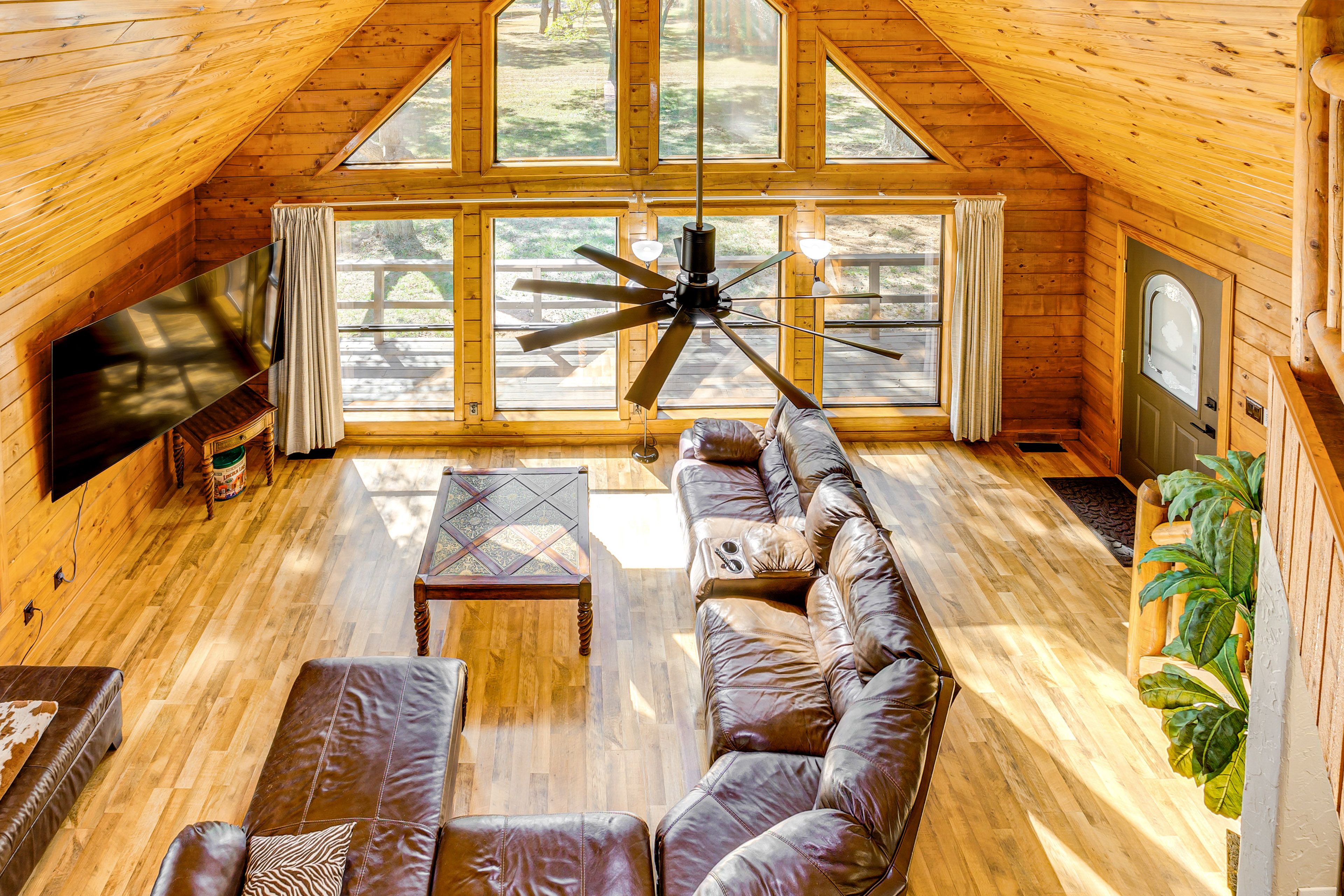 Living Room | 1st Floor | Electric Fireplace | Smart TVs | Tree-Lined Views