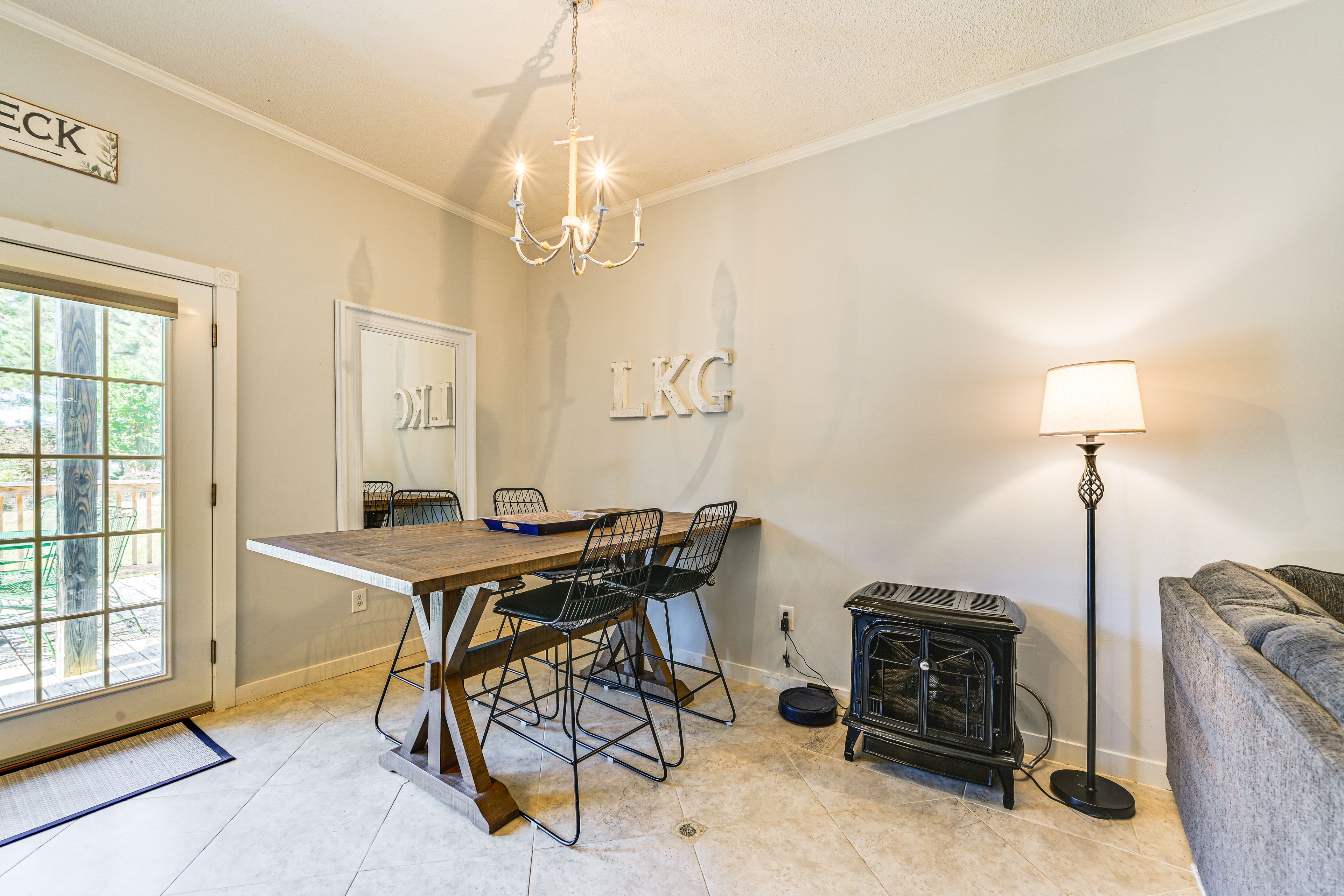 Dining Area | Dishware/Flatware Provided | Electric Fireplace | 1st Floor