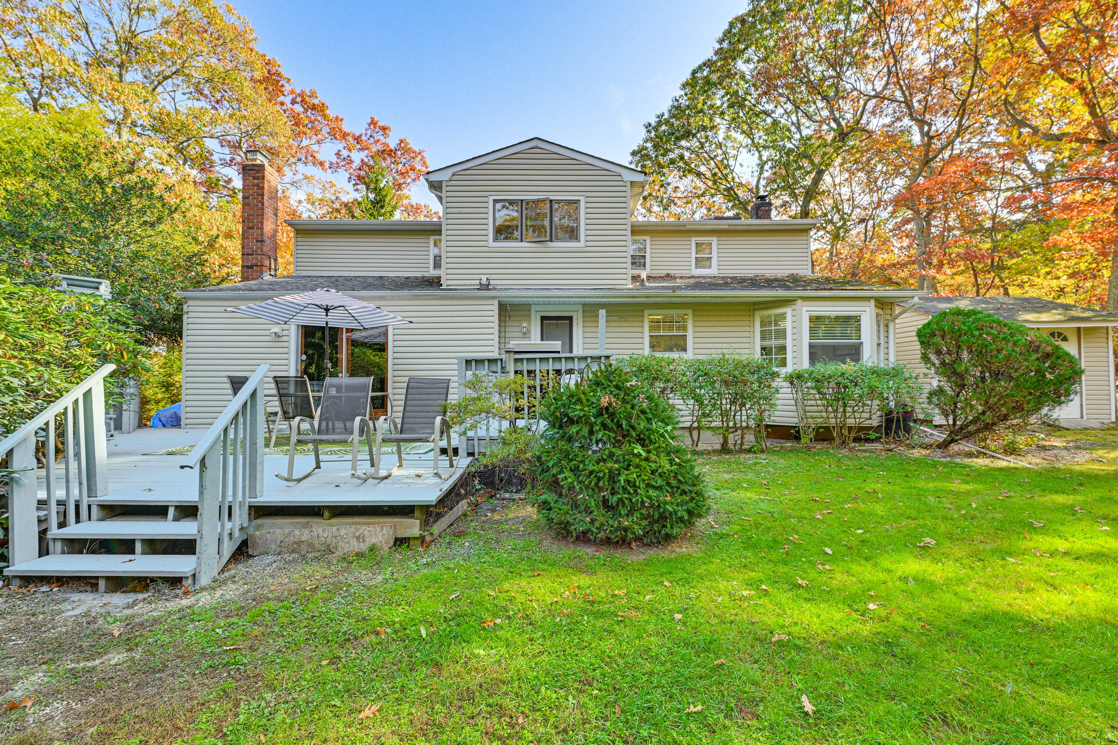 Exterior | 2-Story Home | Spacious Backyard | Furnished Deck