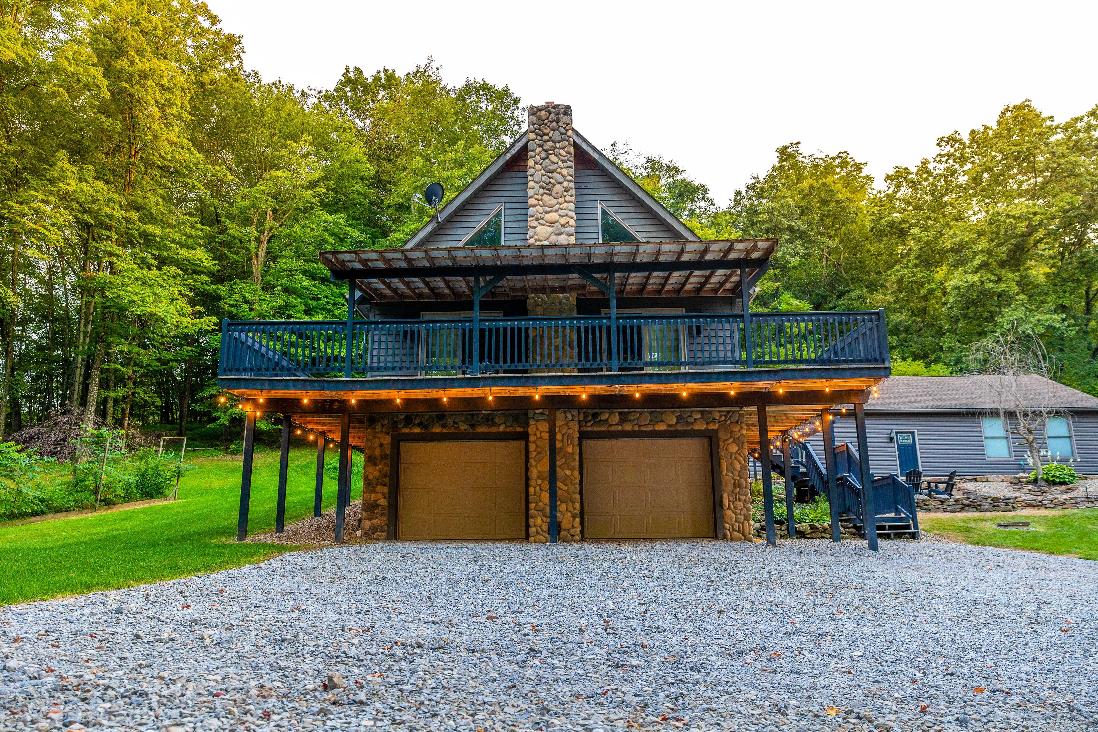 Property Exterior | Garage (2 Vehicles) | Driveway (12 Vehicles)