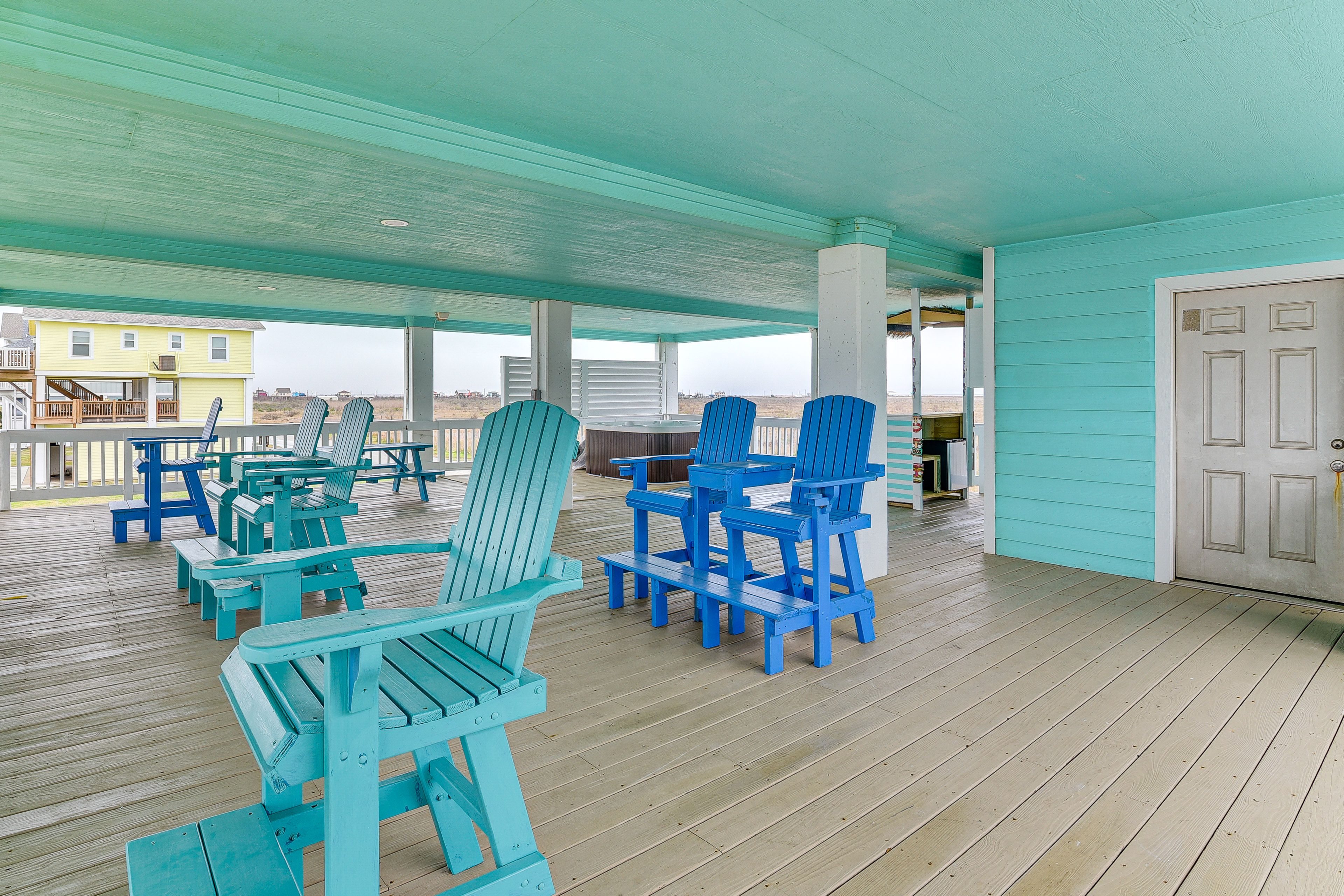 Covered Deck | 1st Floor | Hot Tub | Bar w/ Mini Refrigerator