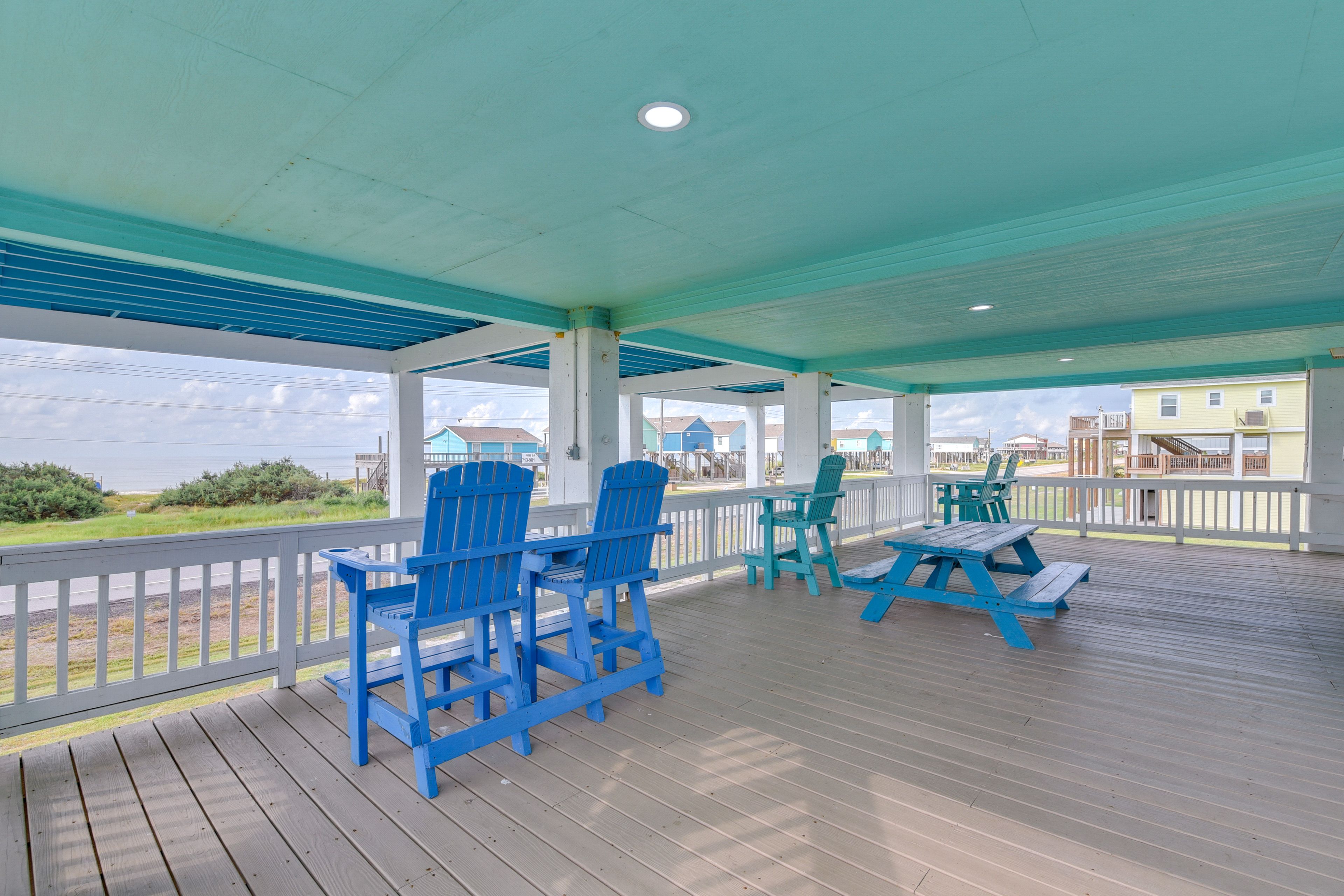 Covered Deck | 1st Floor | Hot Tub | Bar w/ Mini Refrigerator