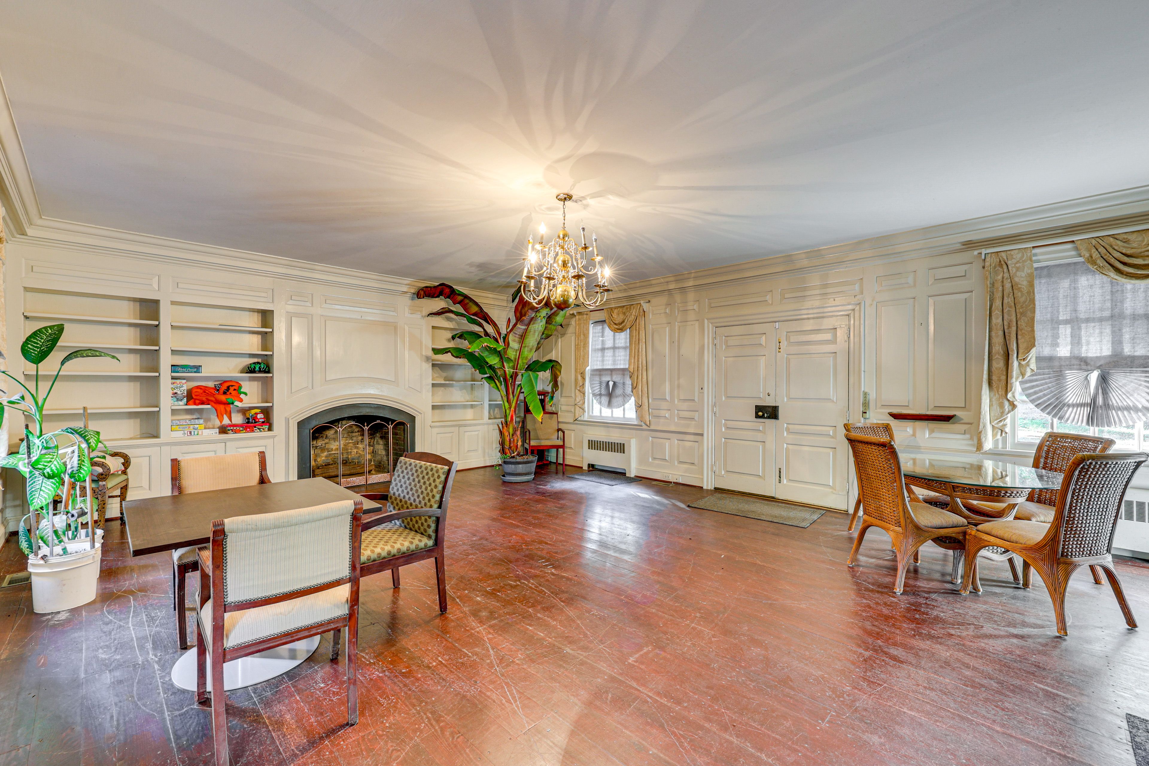 Great Room | 1st Floor w/ Steps to Enter | Wood-Burning Fireplace | Board Games