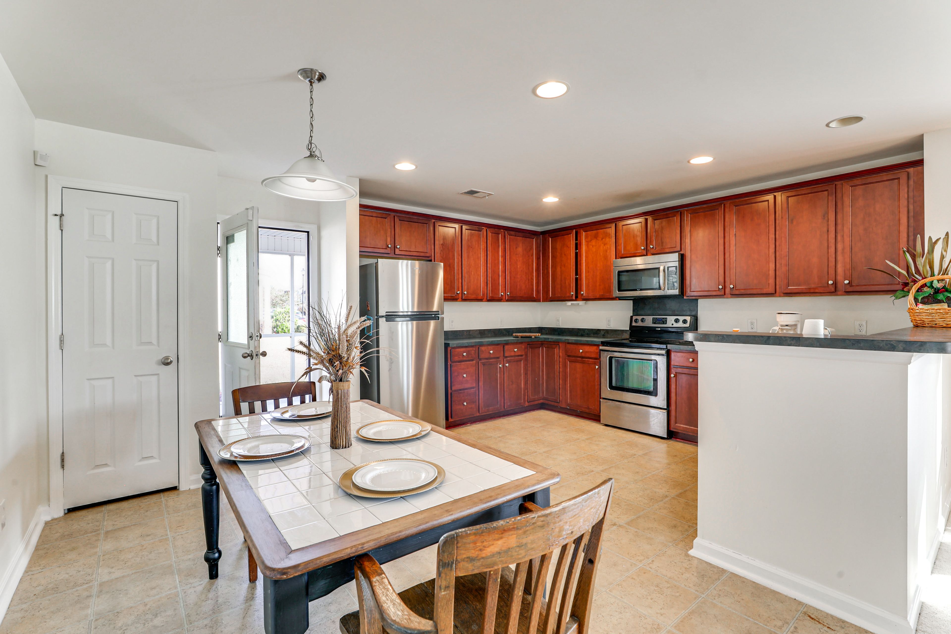 Dining Area | Kitchen | Access to Screened Porch