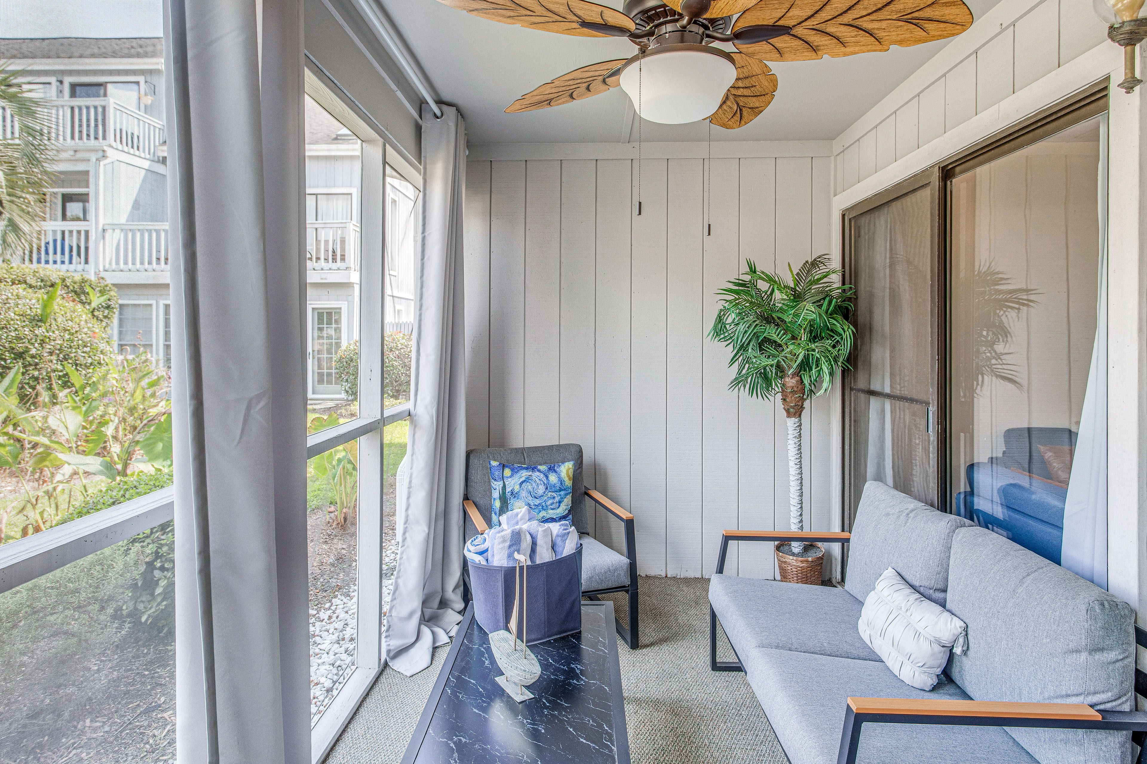 Condo Exterior | Screened Sunroom | Beach Towels
