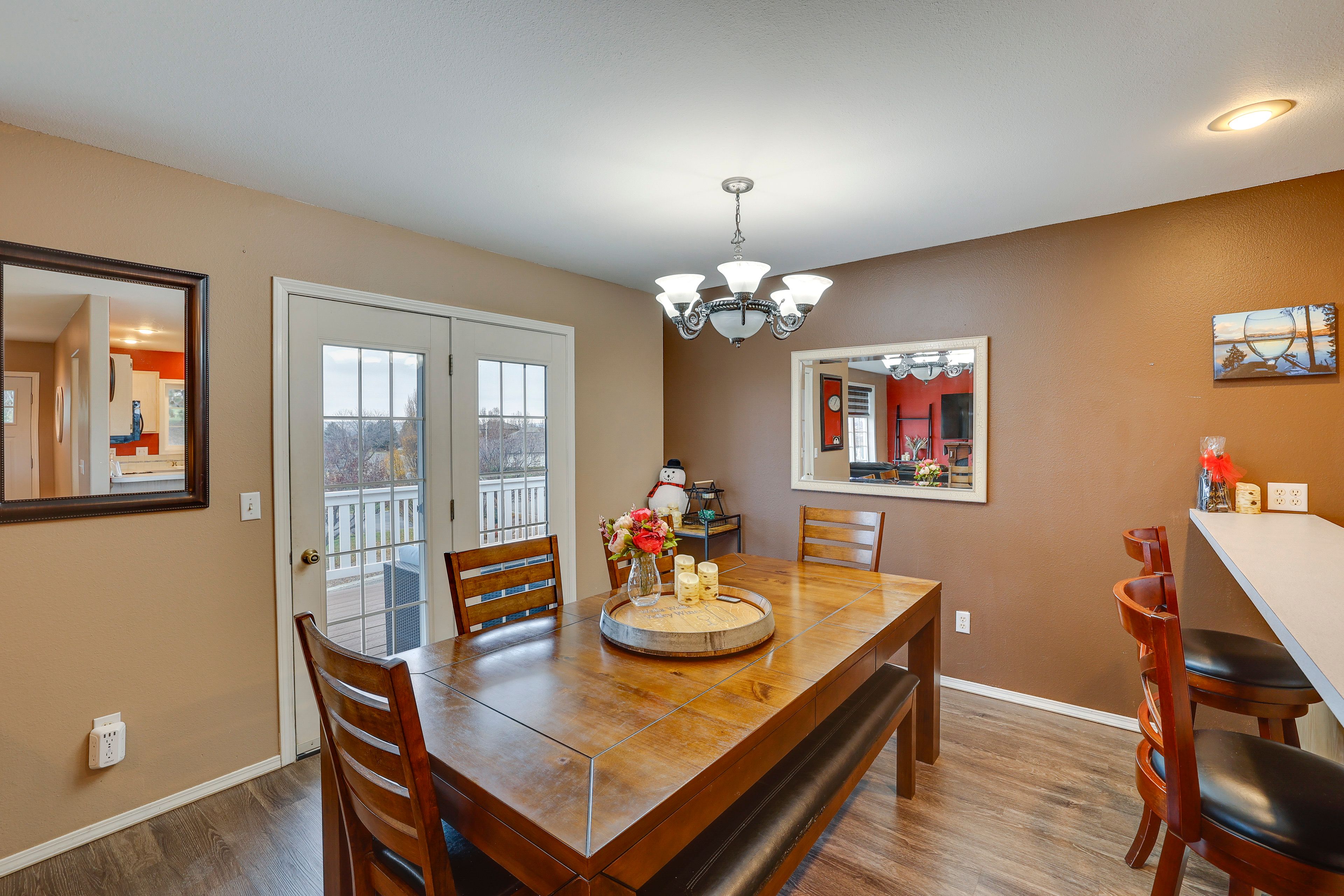 Dining Area | Main Level | Dishware & Flatware Provided | Deck Access