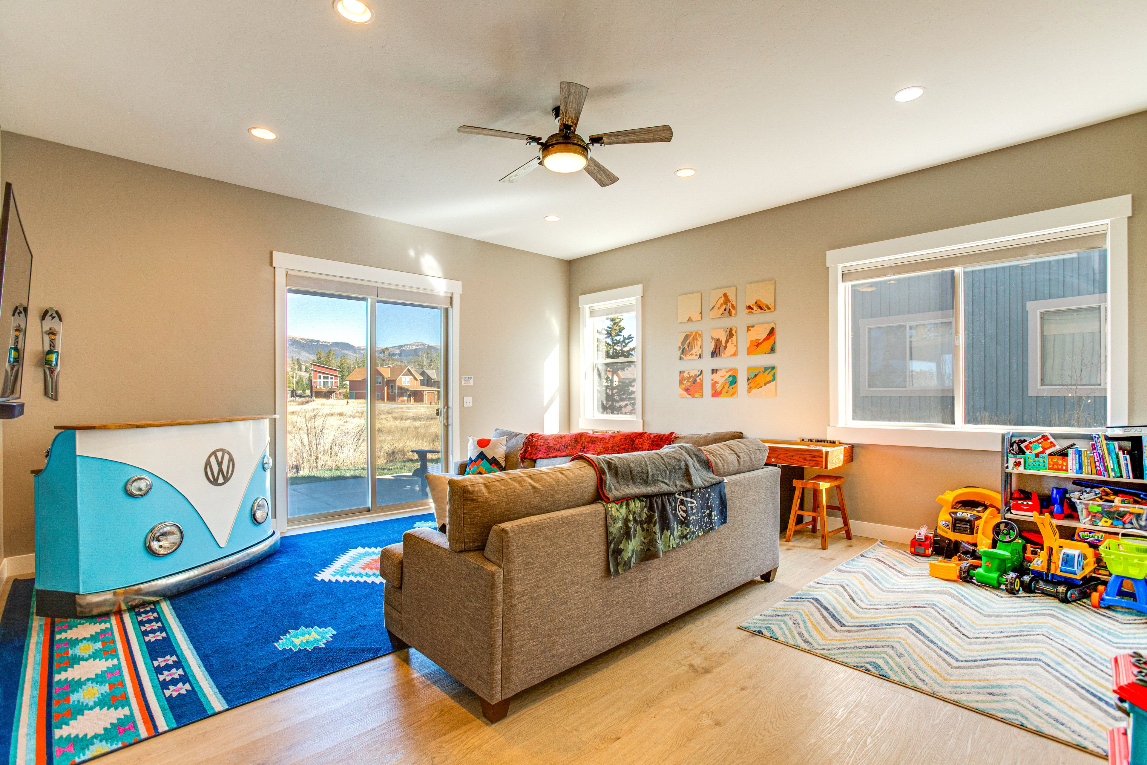 Basement Living Area | Kids' Toys & Books | Shuffleboard Table