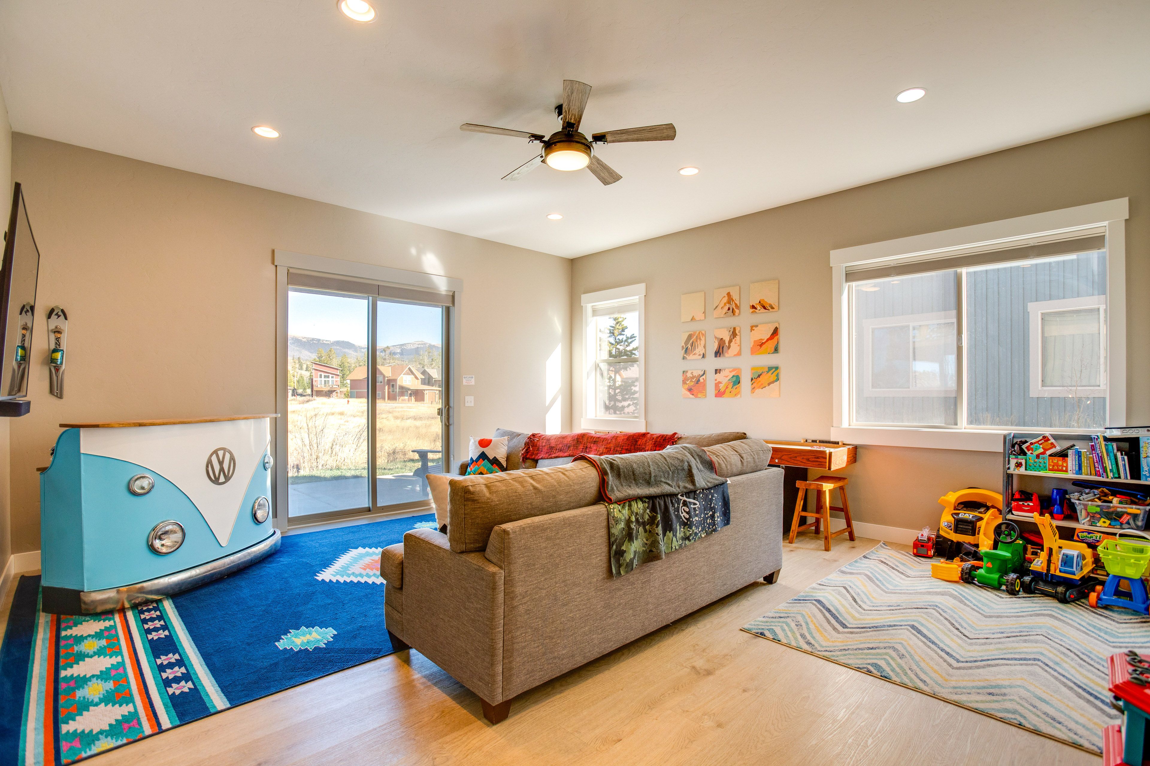 Basement Living Area | Kids' Toys & Books | Shuffleboard Table
