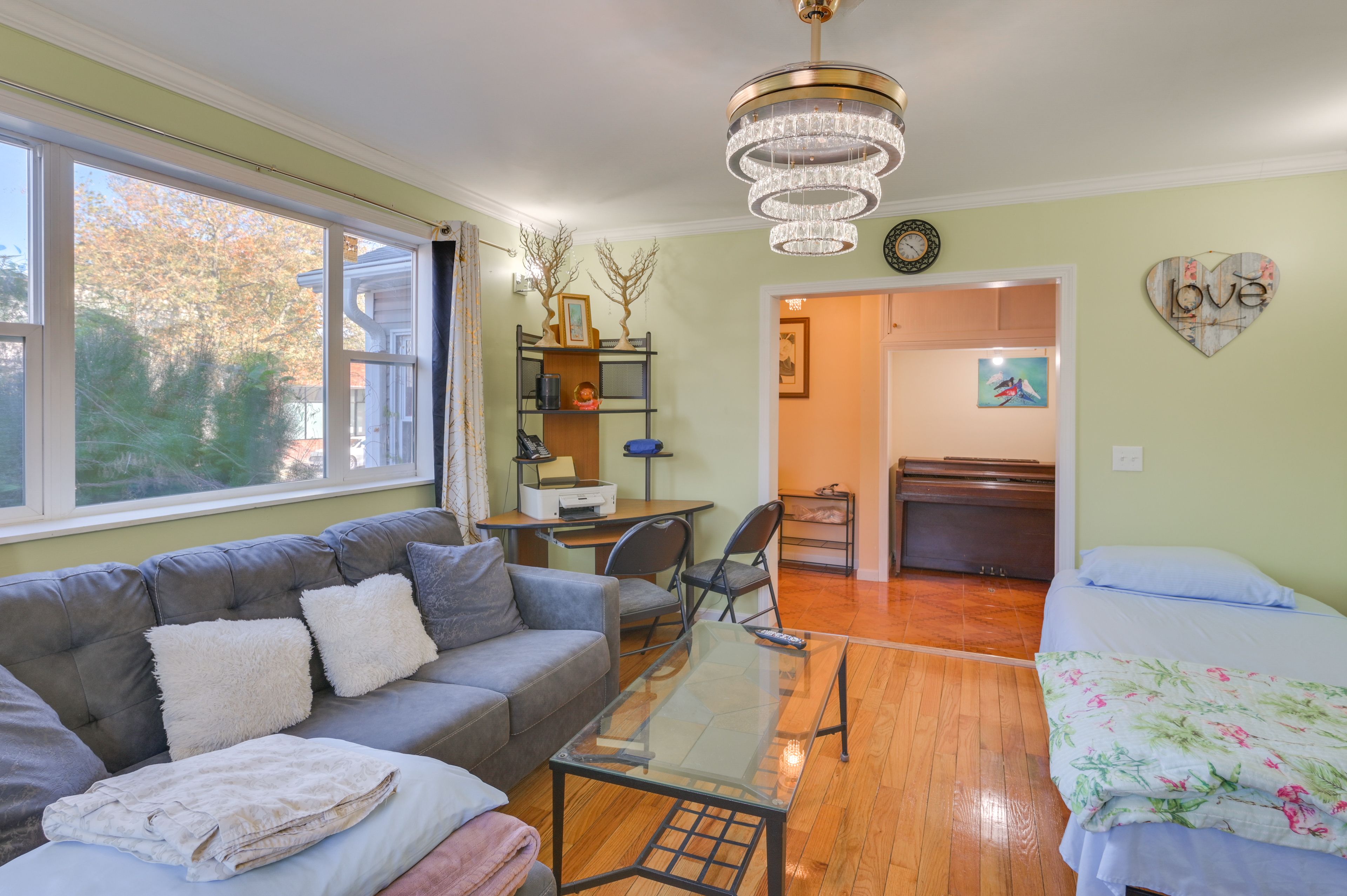 Living Room | Twin Bed | Desk w/ Printer | Free WiFi
