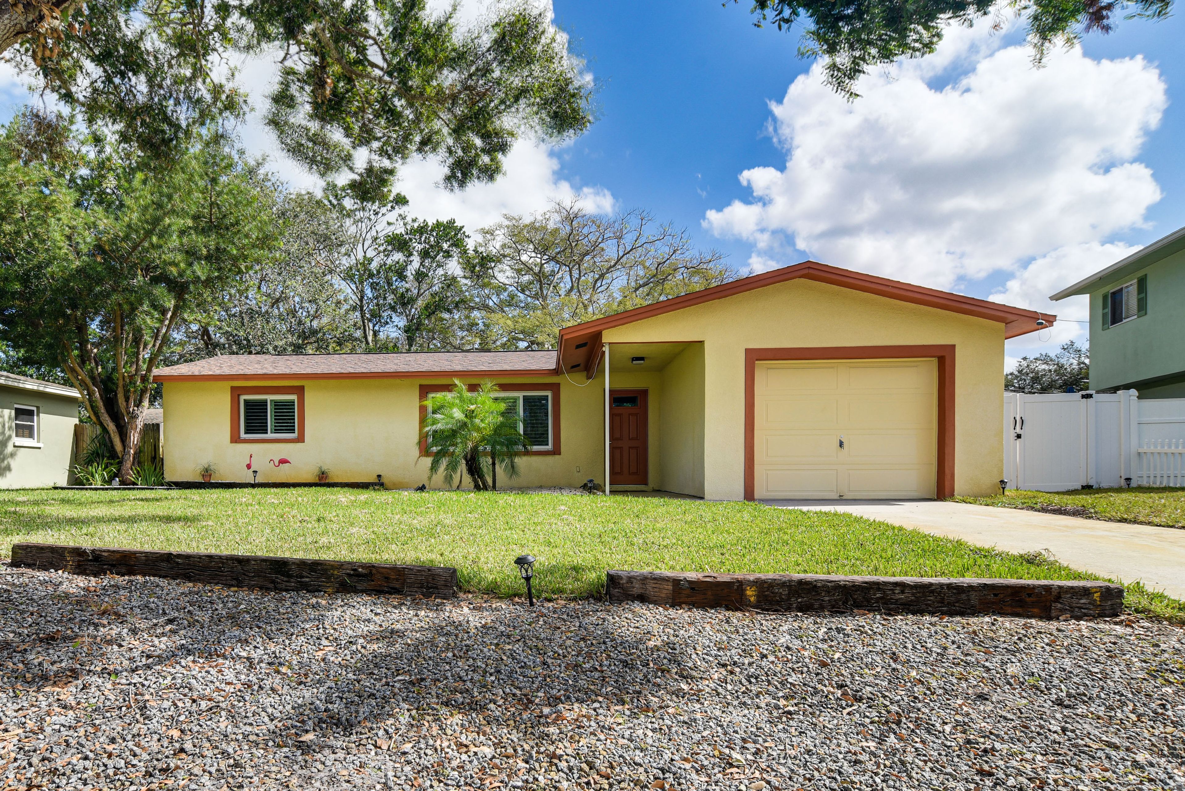 Home Exterior | Parking | Driveway (2 Vehicles) | Gravel Area (3 Vehicles)