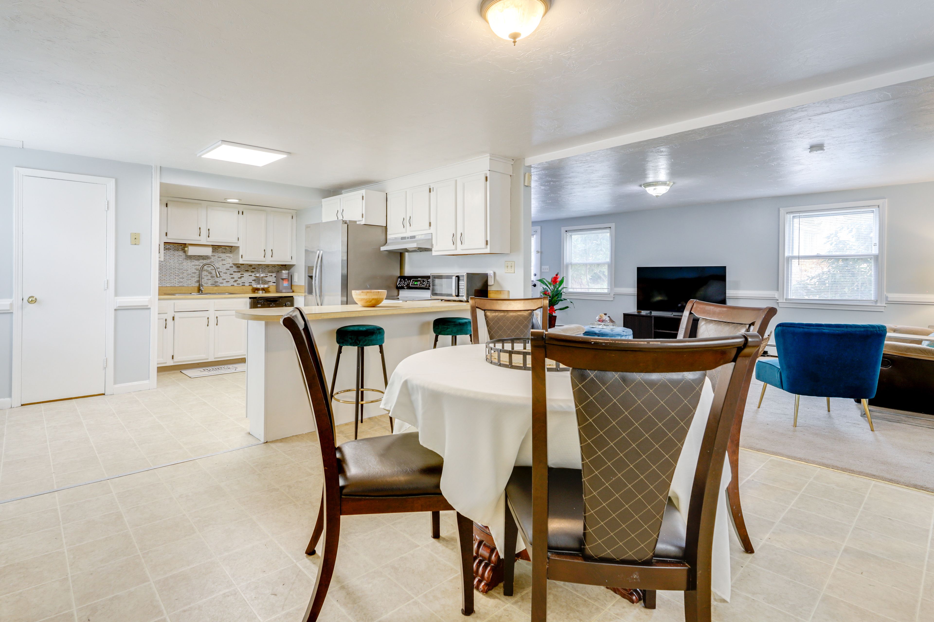 Dining Area & Kitchen | Self Check-In | Central Heating & A/C