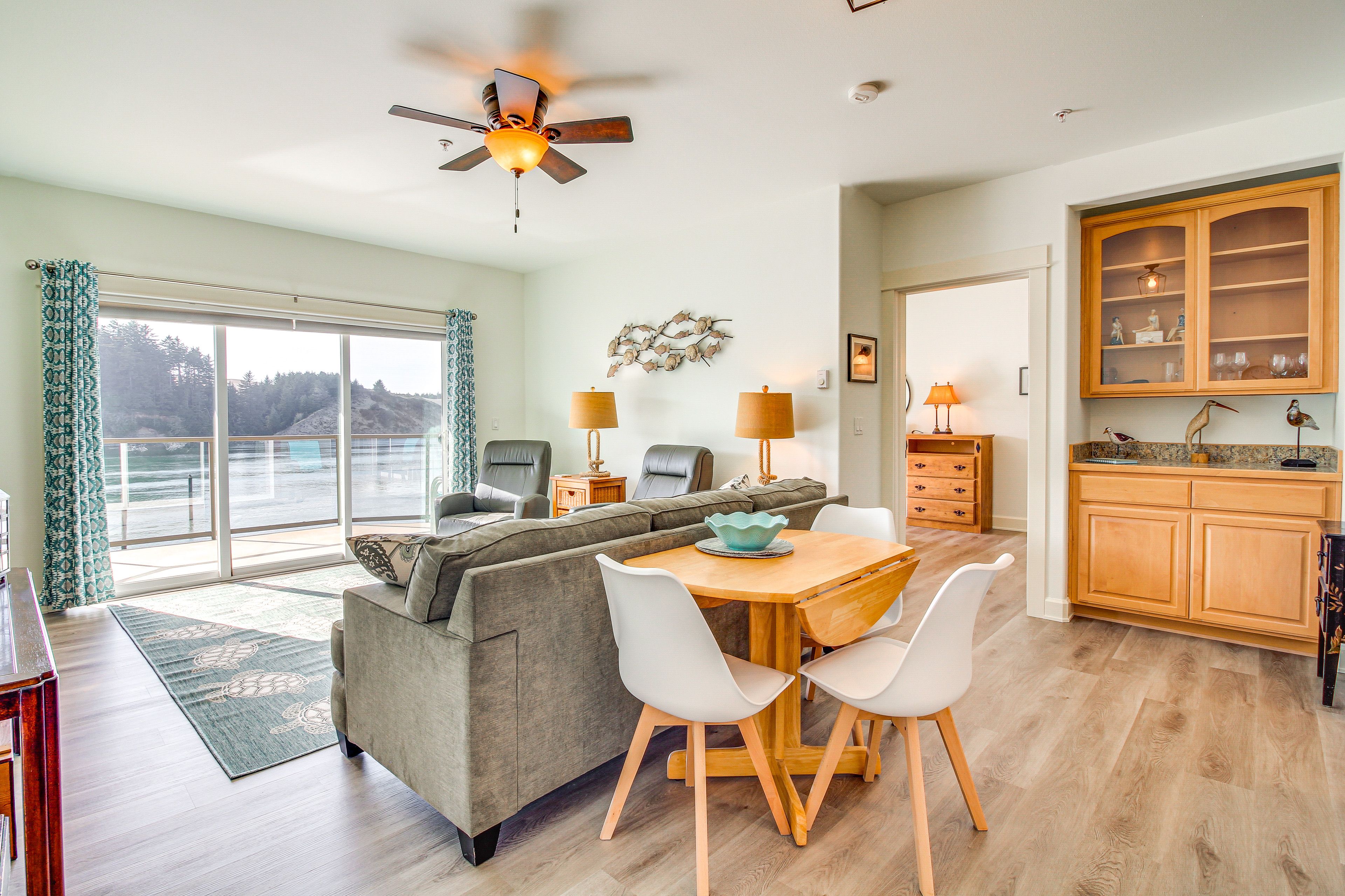 Living/Dining Area | Single-Story Condo | Open Floor Plan | River View
