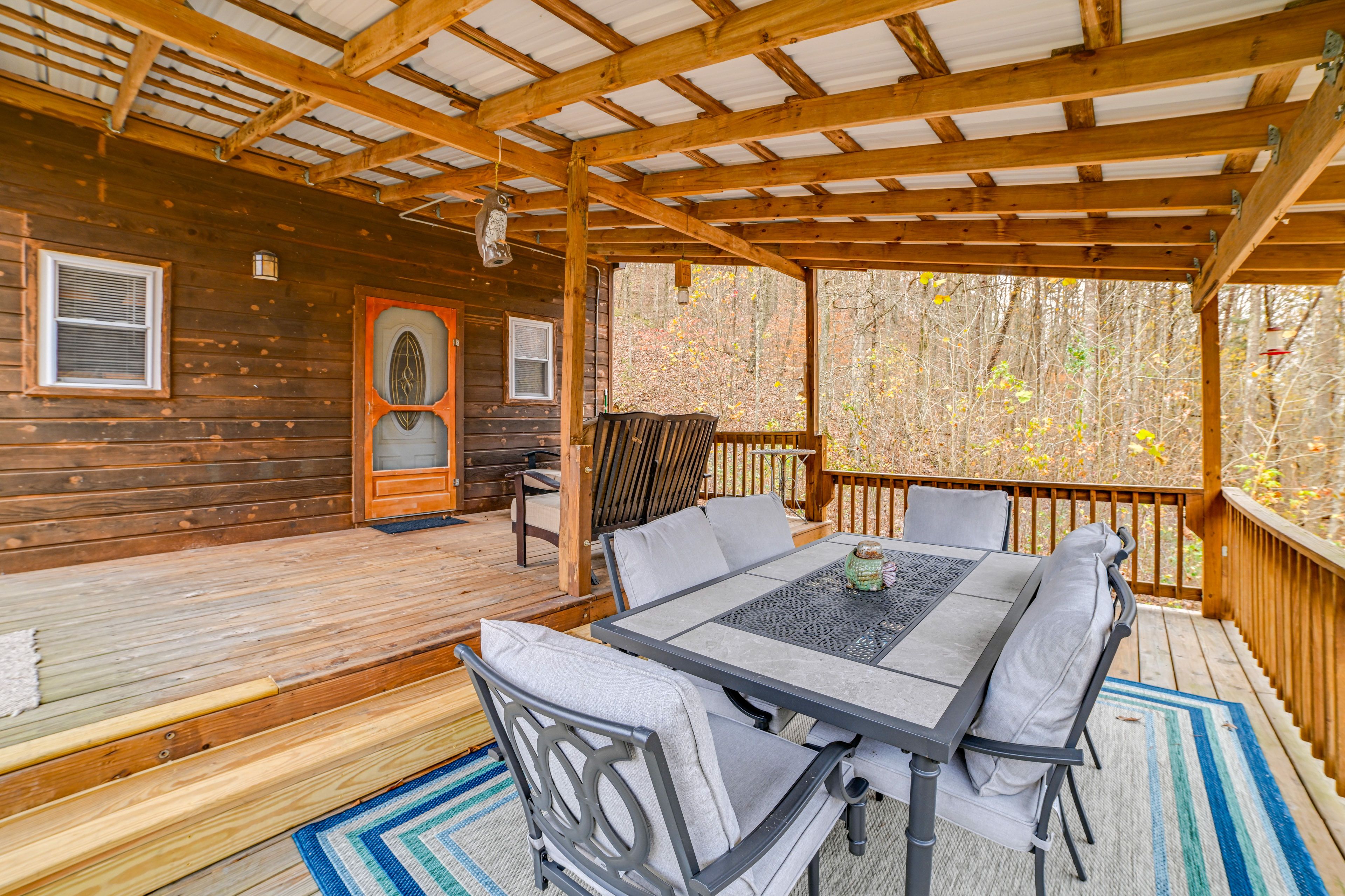 Cabin Exterior | Furnished Deck | Dining Area