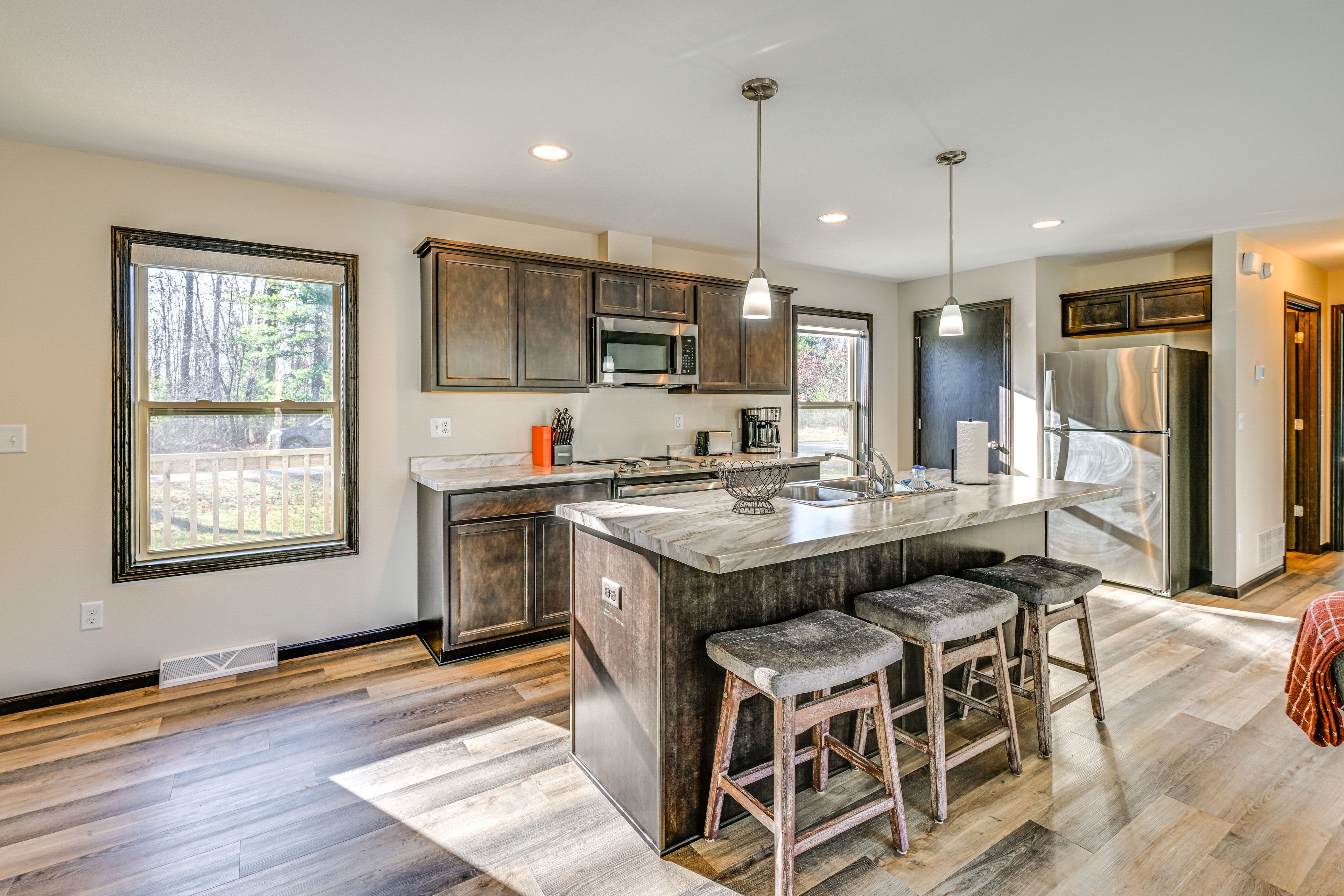 Dining Area | Main Level | Breakfast Bar | Dishware/Flatware
