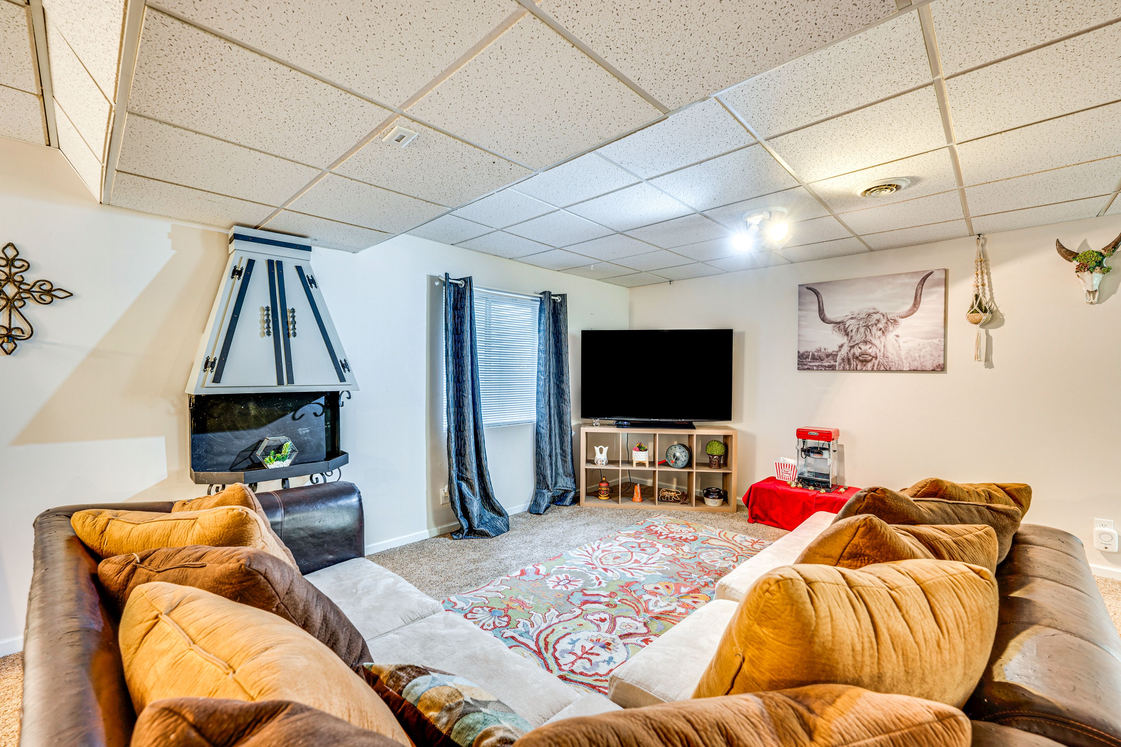 Basement Living Room | Smart TV | Board Games | Exercise Bike