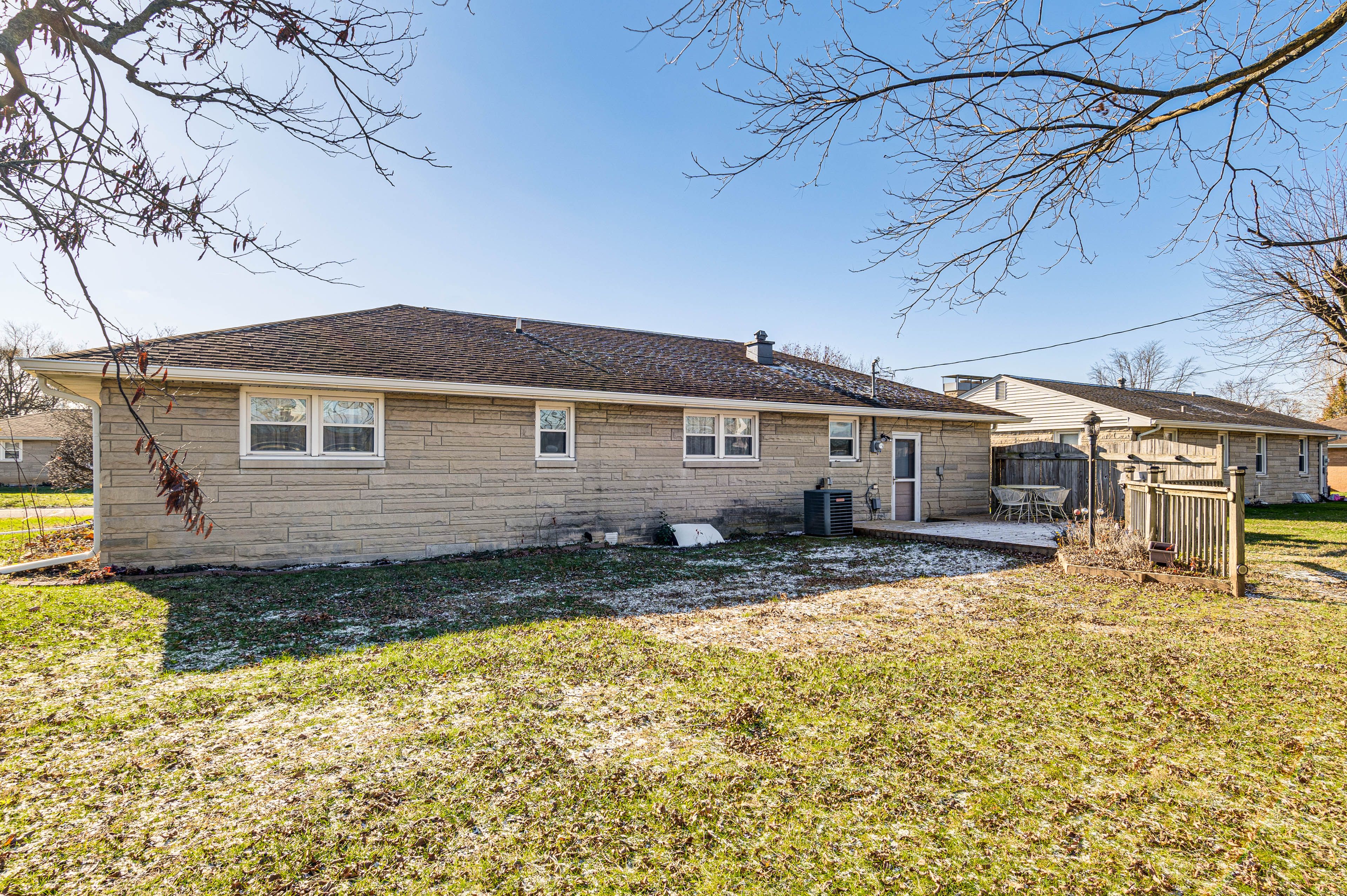 House Exterior | Partially Fenced Backyard