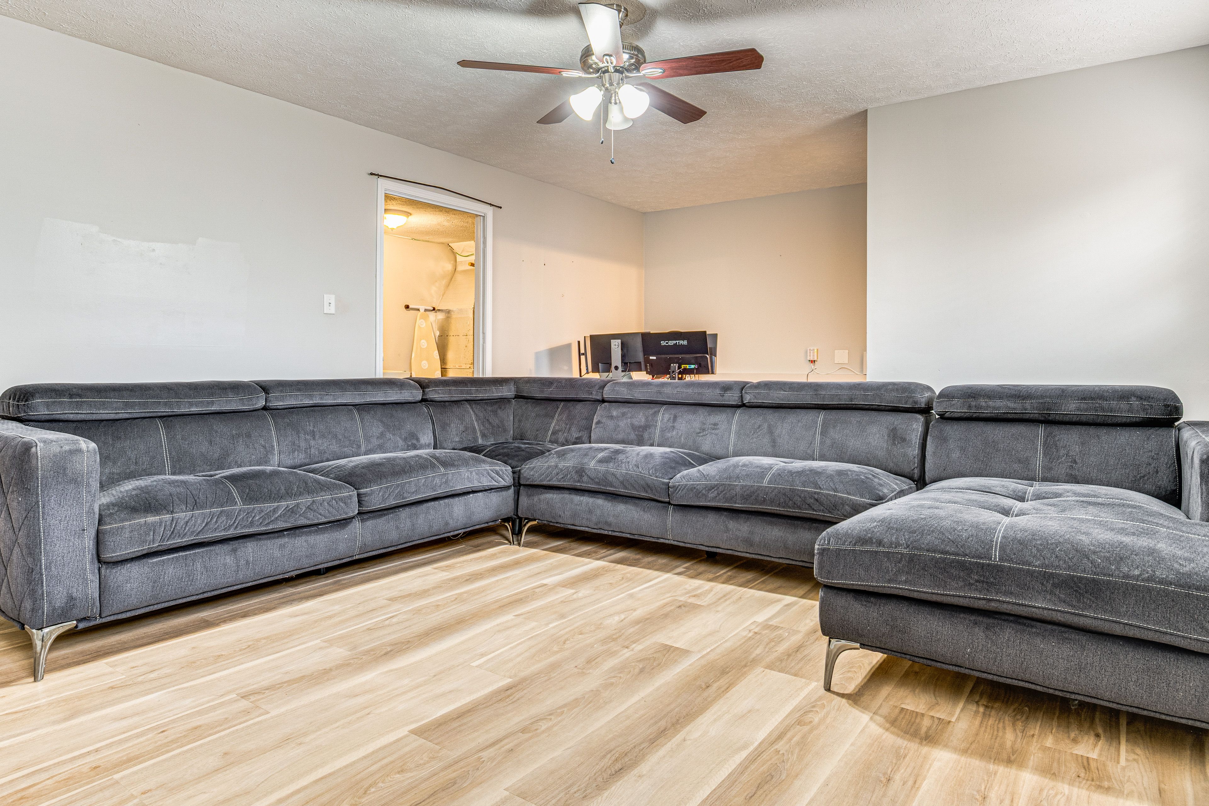 Lower-Level Living Space | Desk w/ Monitors