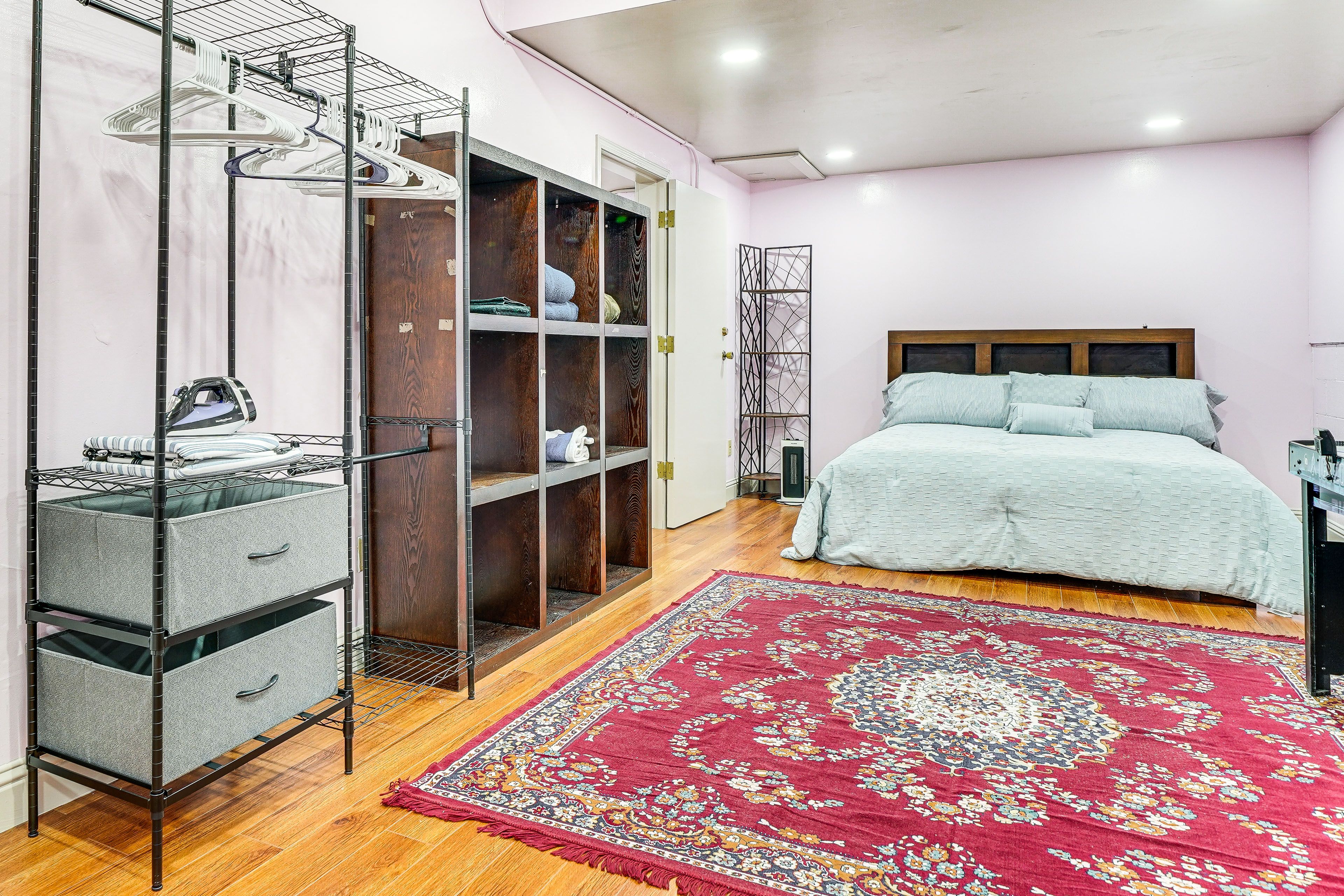Bedroom 1 | California King Bed | Air Hockey Table | Iron & Board