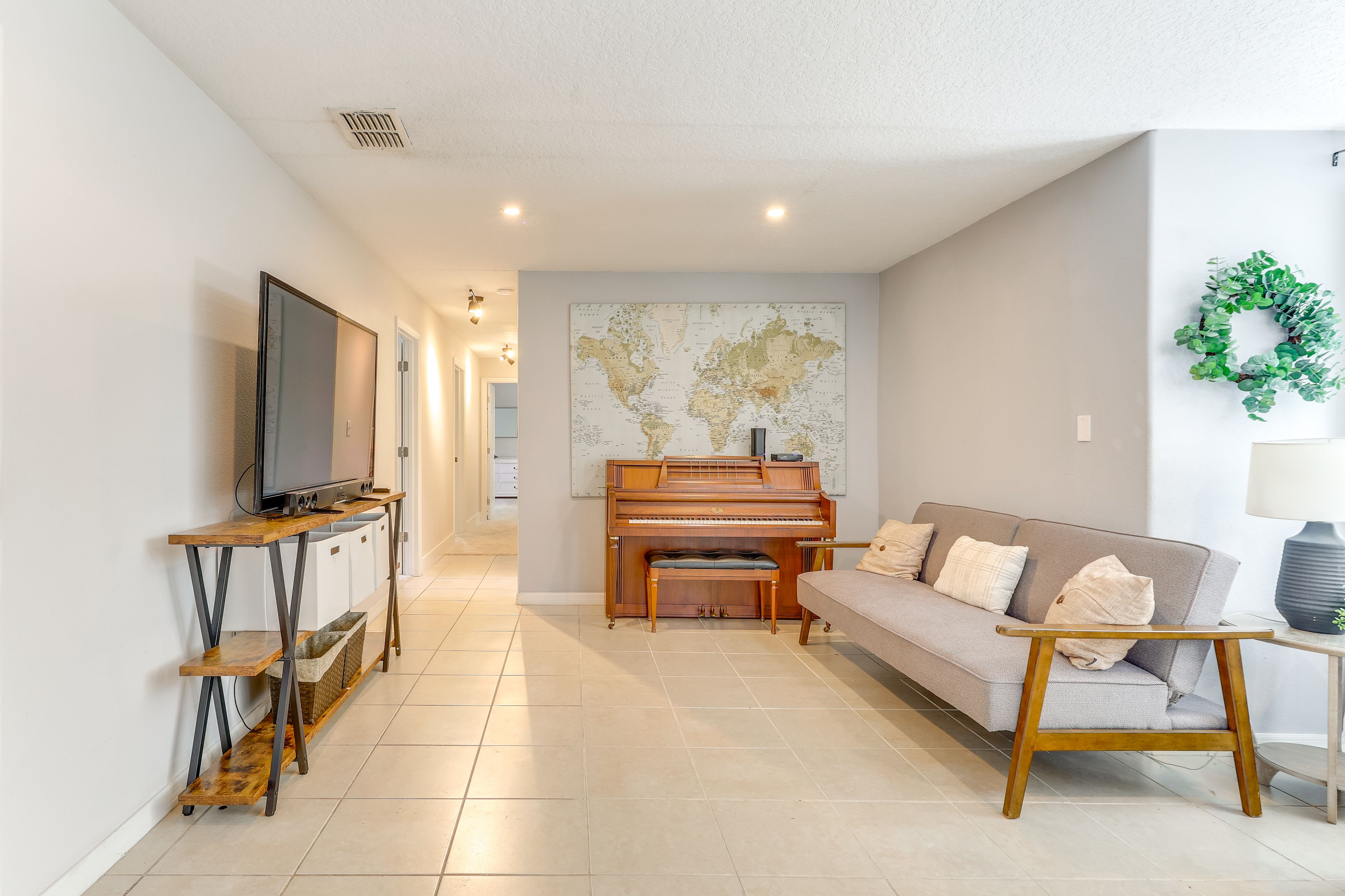 Living Area | Piano | Fireplace | Standing Desk | Workout Weights