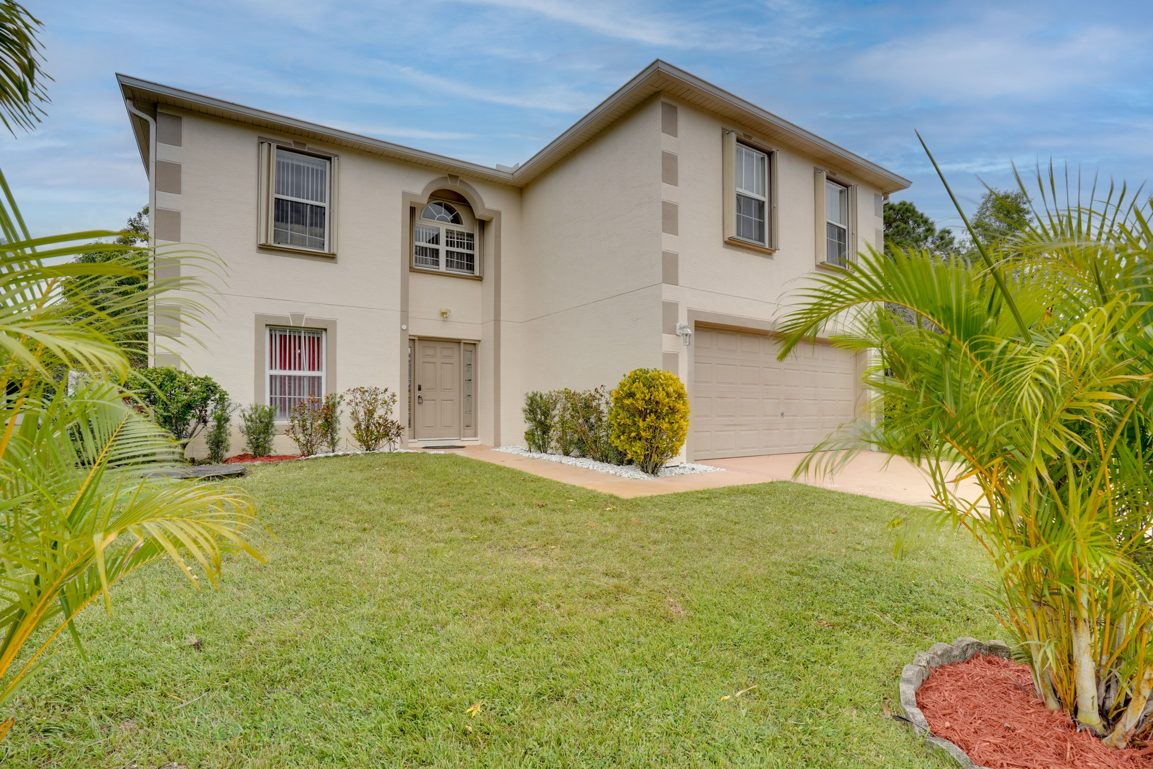 Property Exterior | Screened-In Lanai | Fenced-In Yard