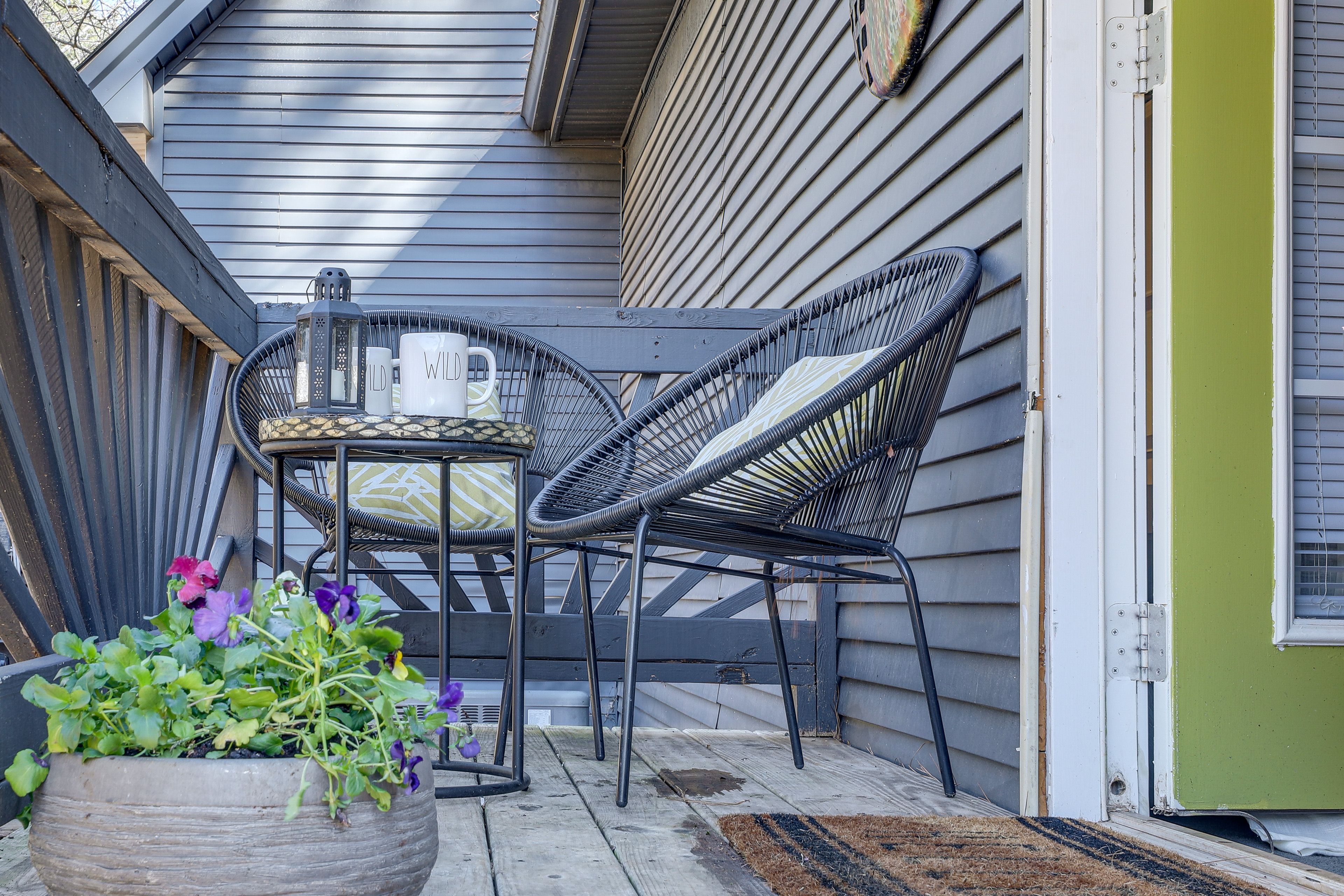 Studio Exterior | Front Porch w/ Lounge Seating | Shared Outdoor Movie Theater