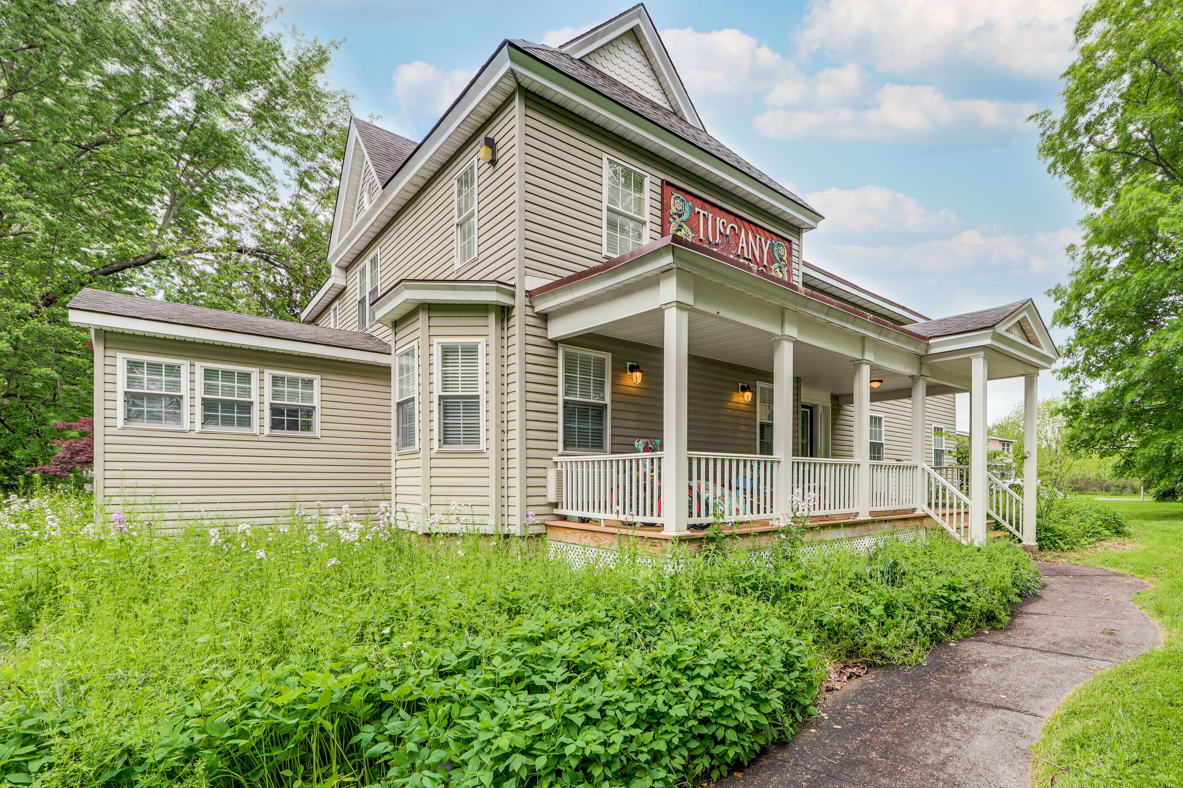 Building Exterior | Designated Parking Spot (1 Vehicle) | Shared Parking Lot