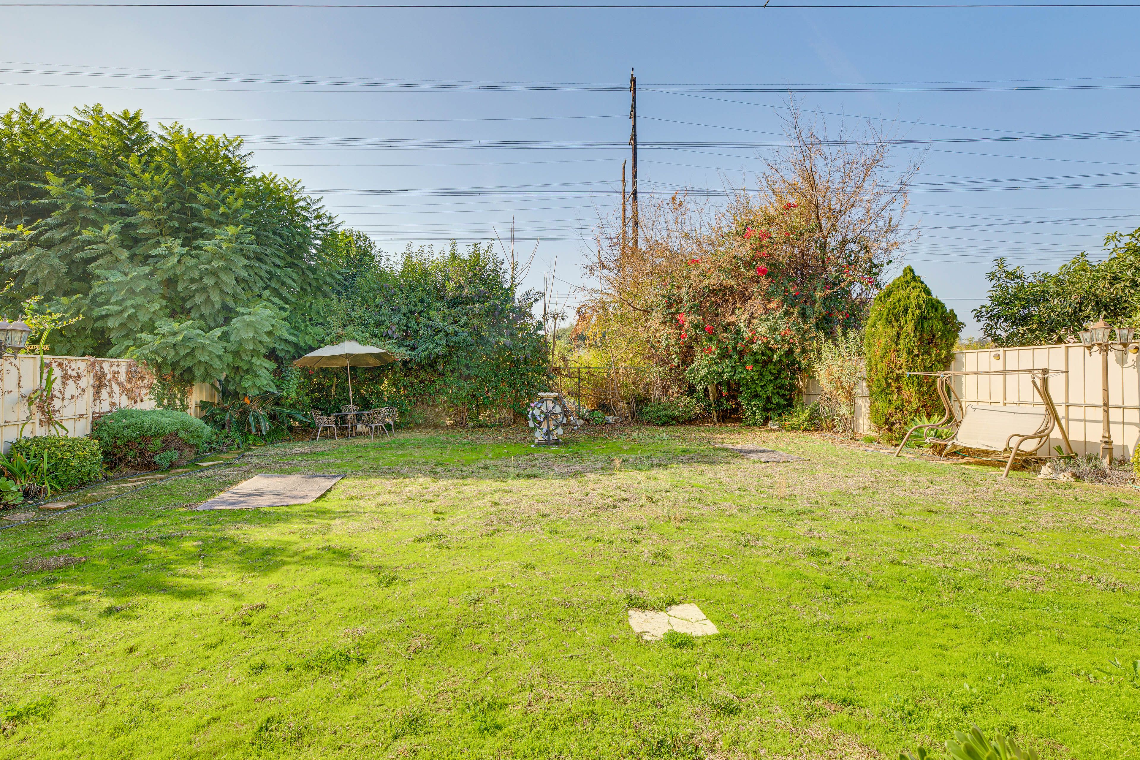 House Exterior | Fenced Backyard | Garden