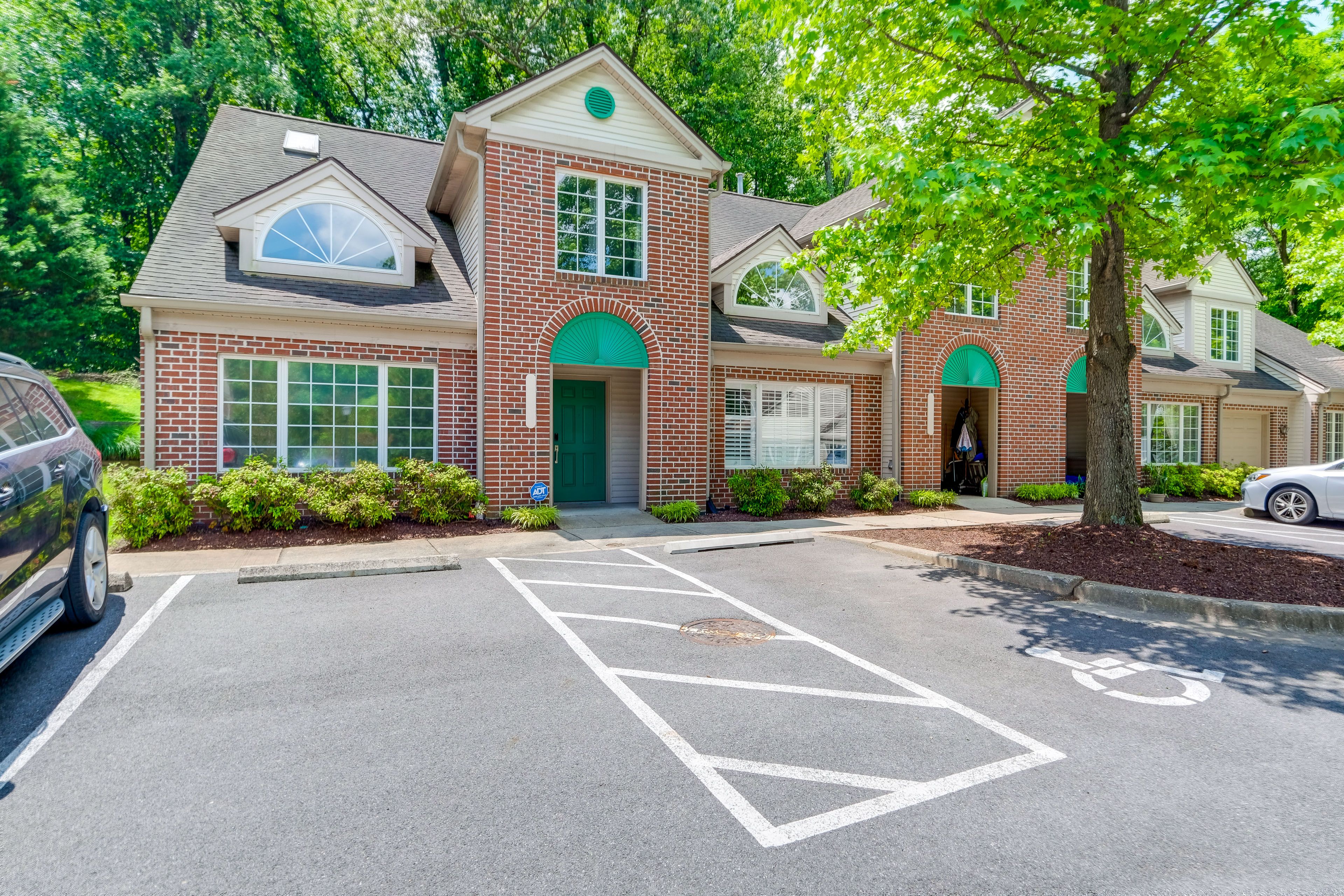Condo Exterior | Parking | Community Lot (2 Vehicles)