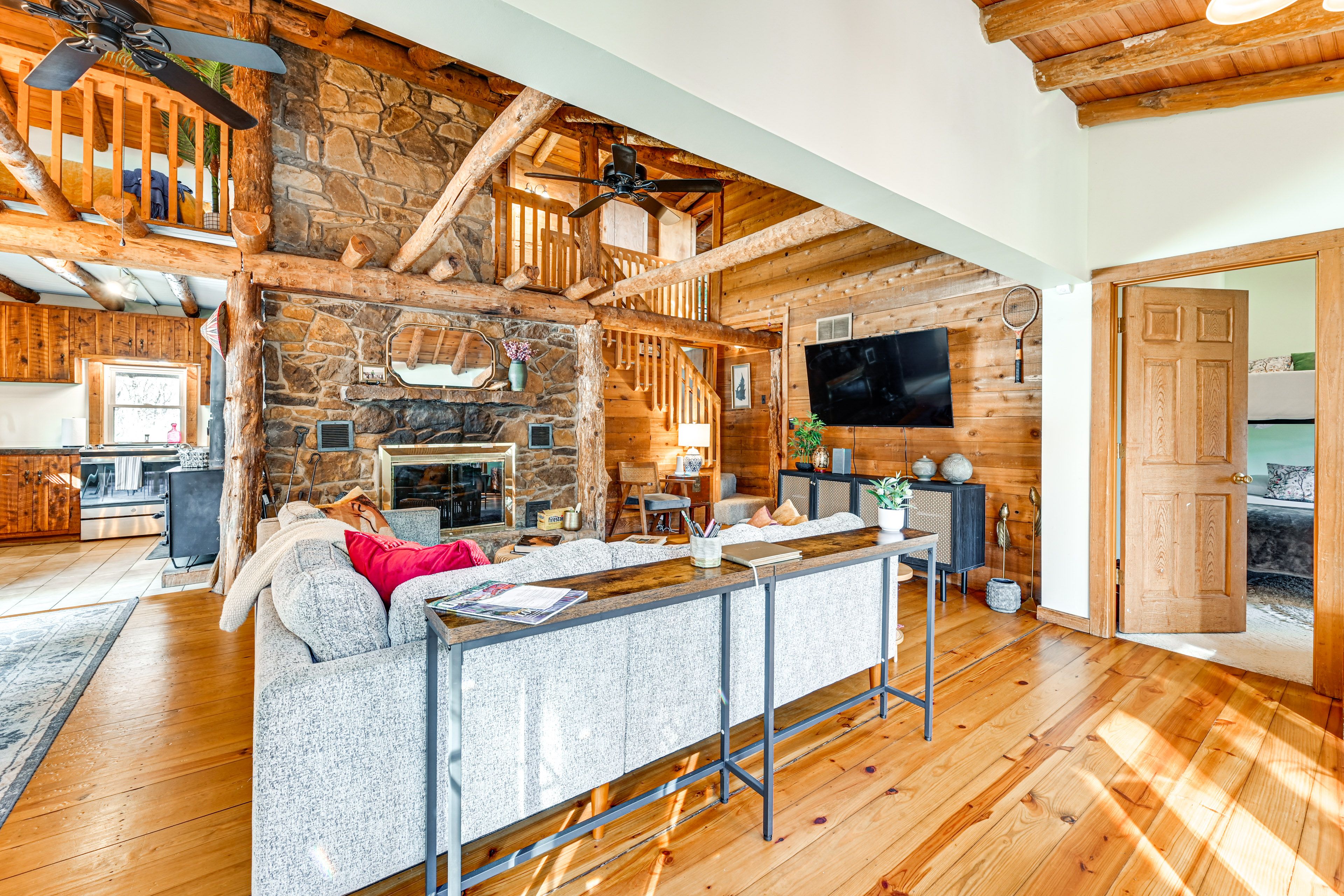 Living Room | Stone Fireplace | Central Heating & A/C | 1st Floor