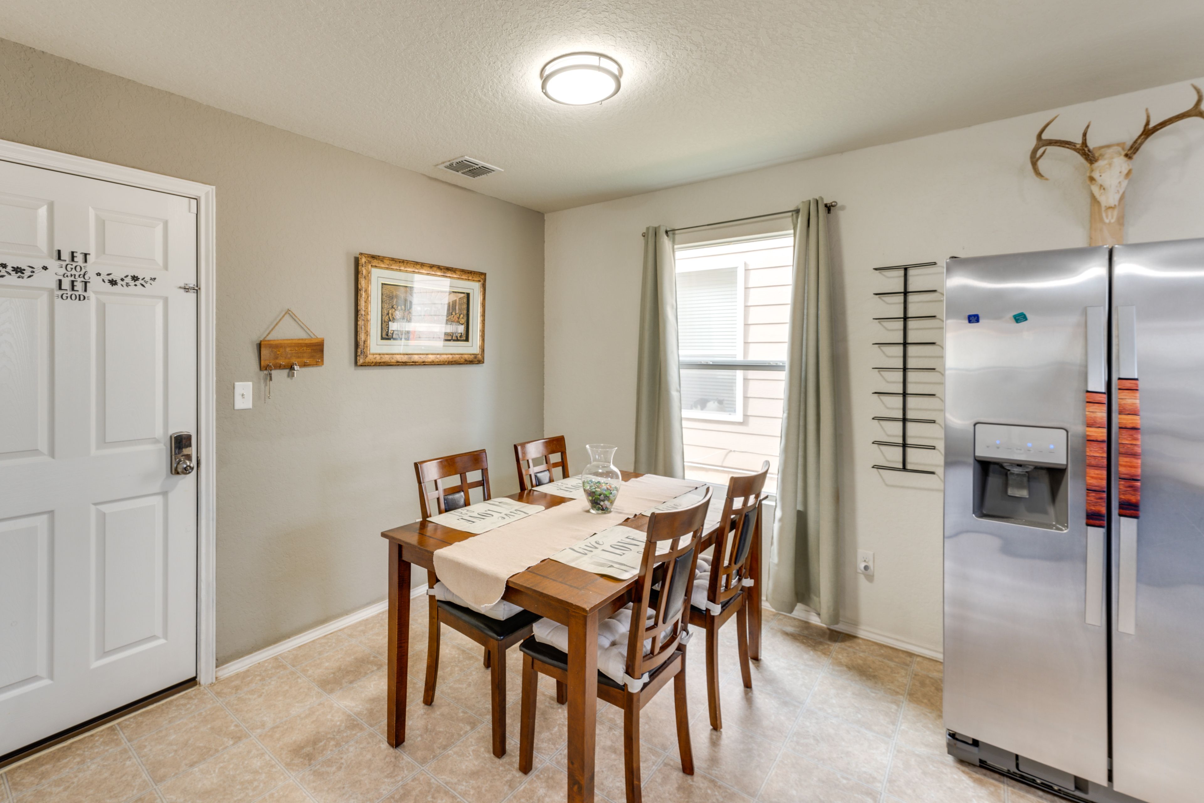 Dining Area | Dishware & Flatware Provided | Central A/C & Heat | 1st Floor