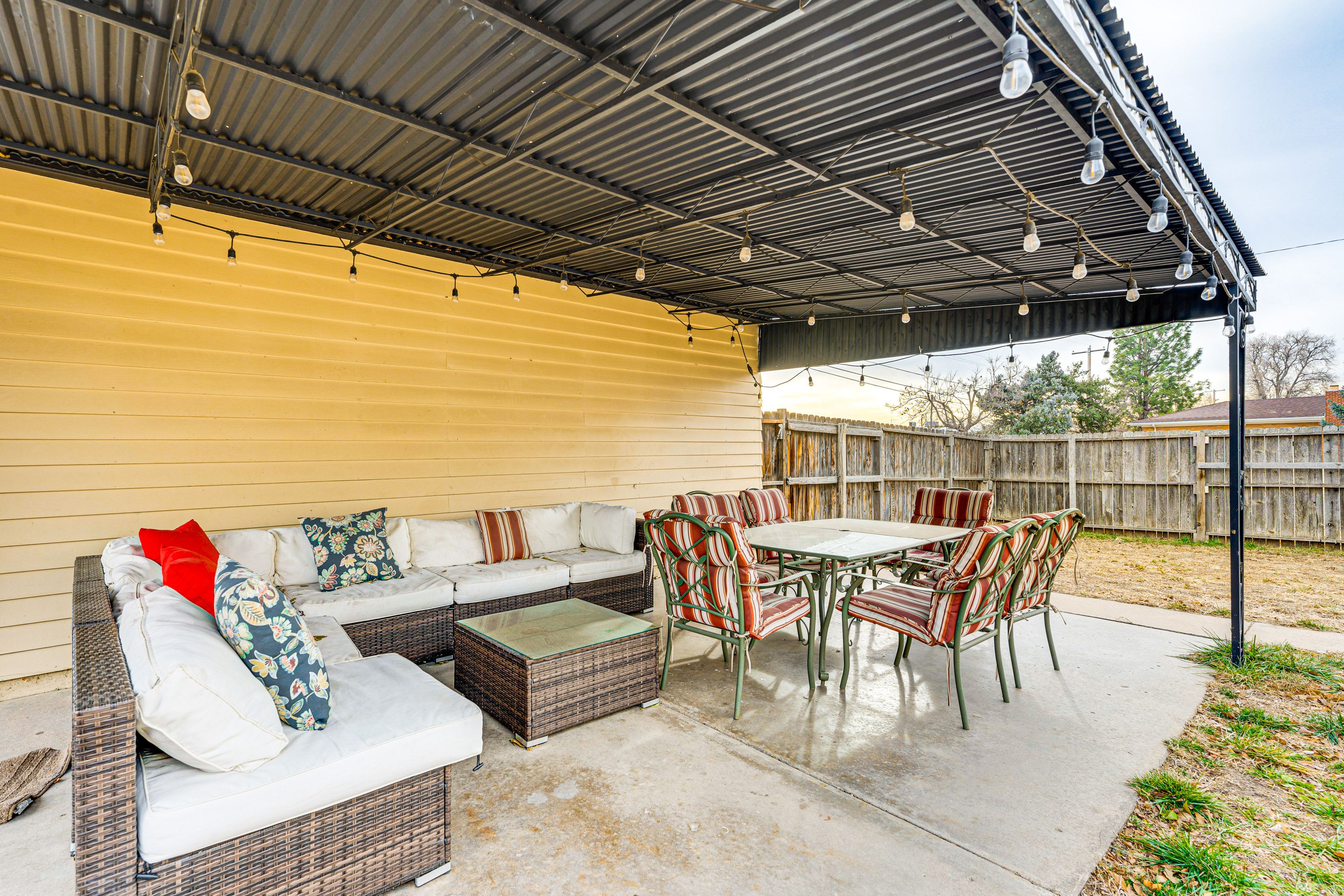 Covered Patio | Lounge Seating | Outdoor Dining Area | Fenced-In Yard