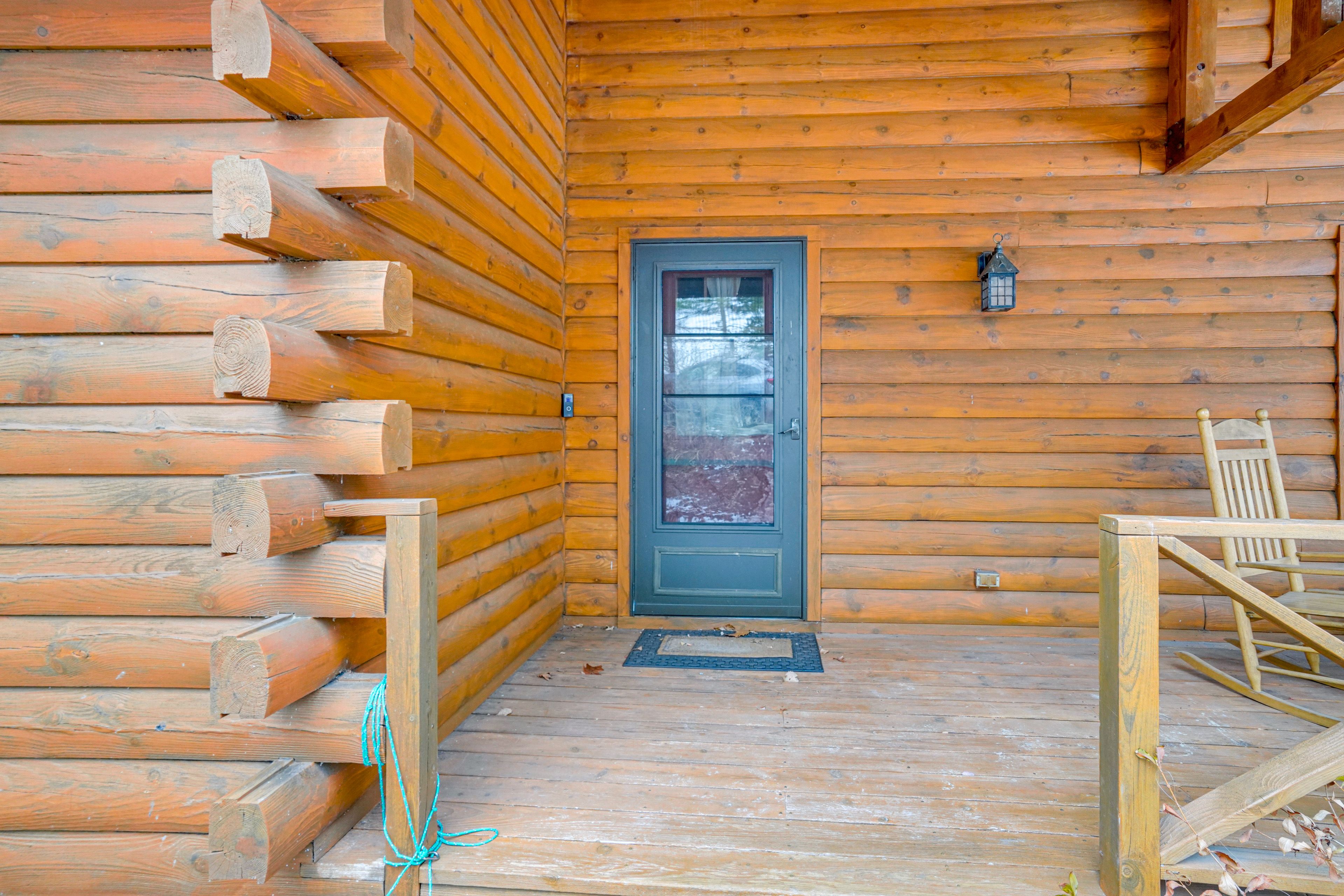 Cabin Exterior | Keyless Entry | Furnished Porch