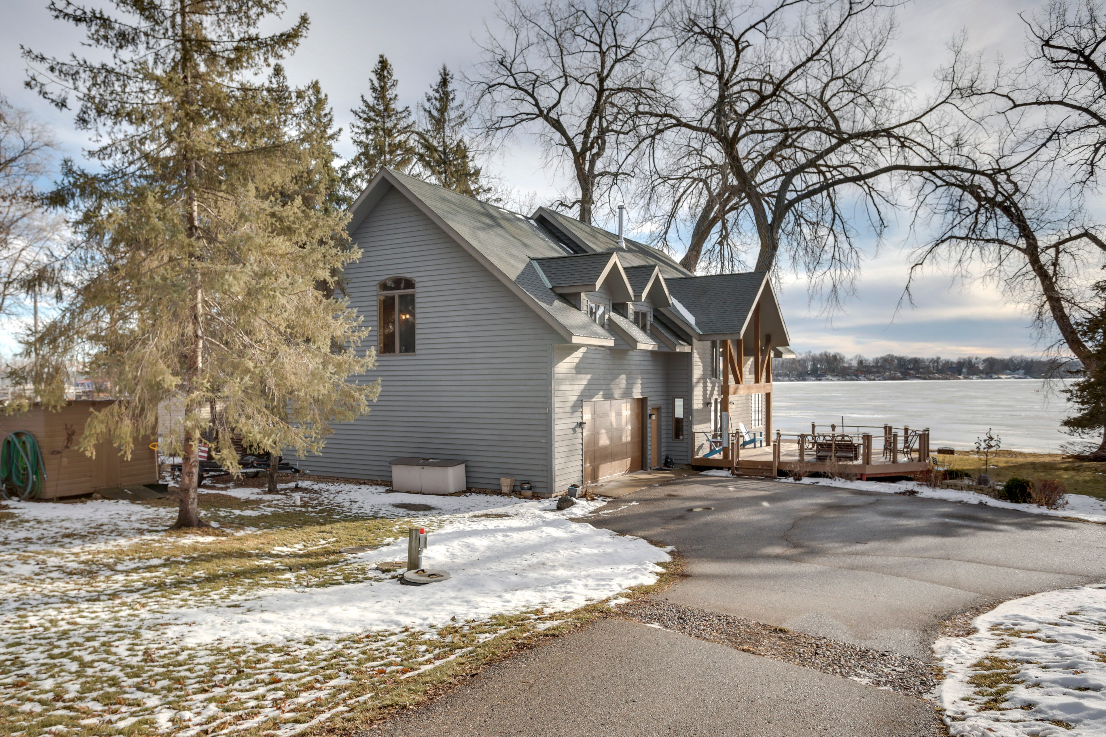 Property Exterior | Lake Views | Gas Grill & Fire Pit | Canoes & Kayaks