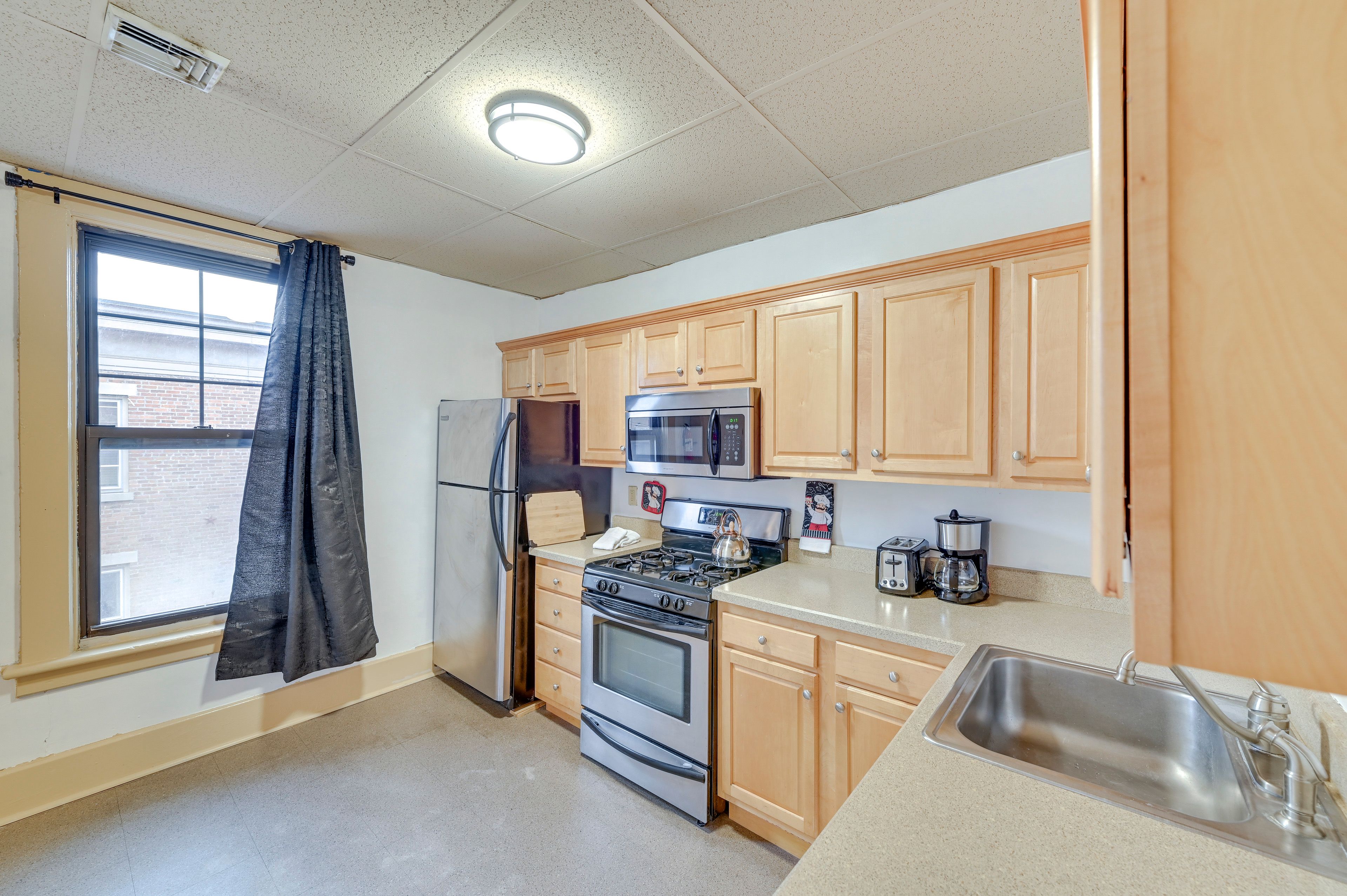 Kitchen | Single-Story Apartment | Central Heating & A/C