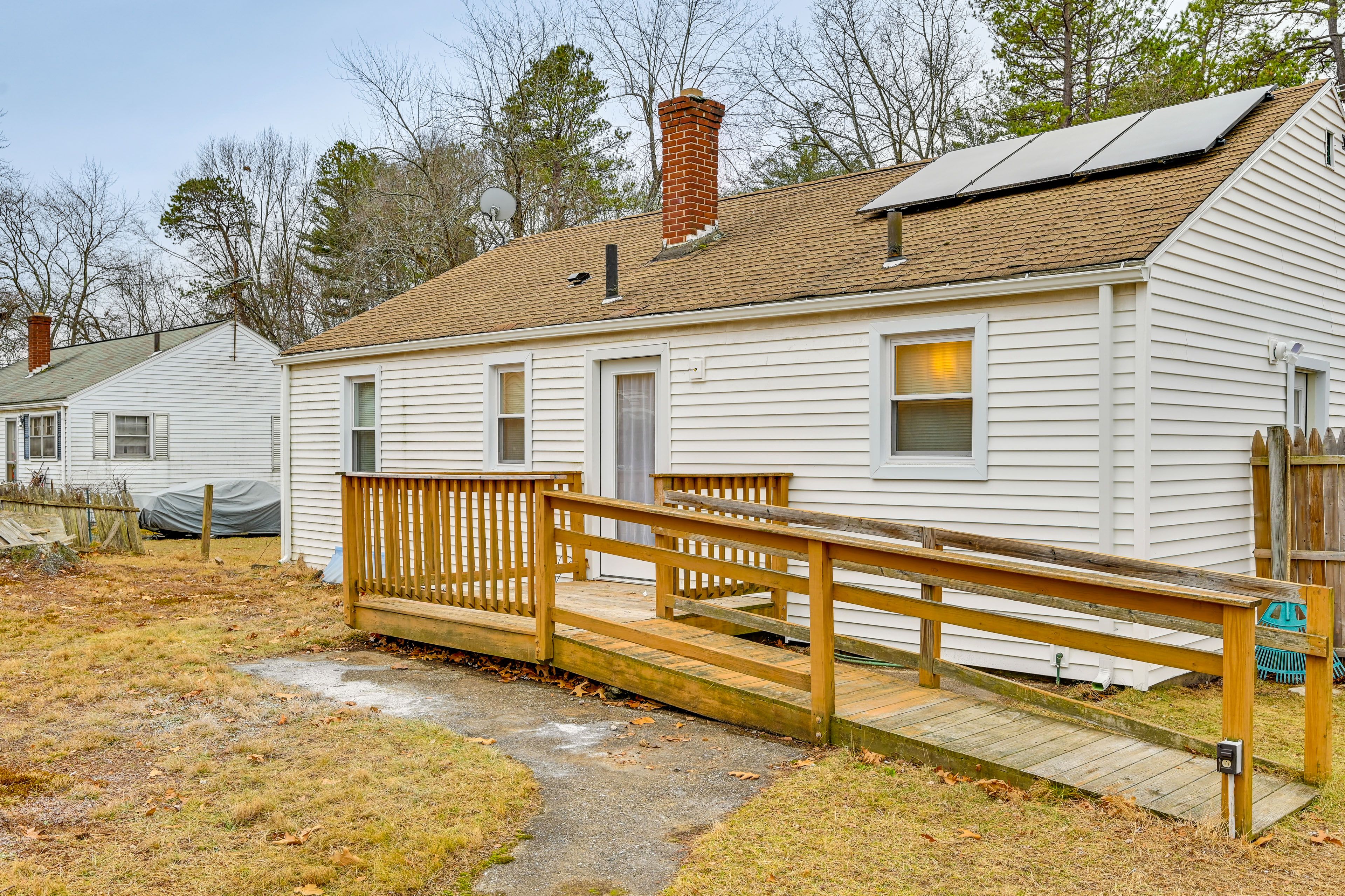 House Exterior | Partially Fenced Backyard