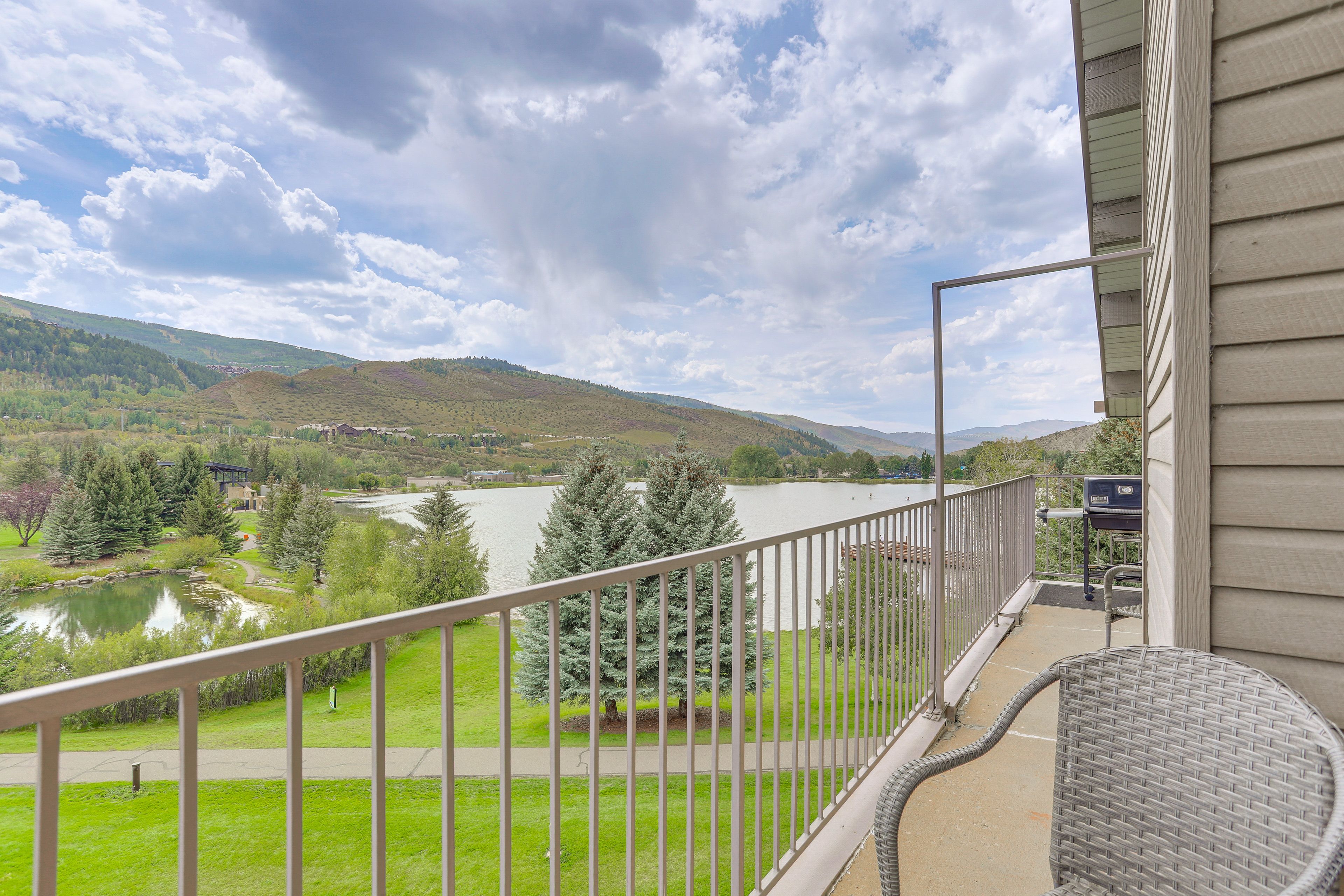 Balcony | Lake & Mountain Views | Seating | Gas Grill