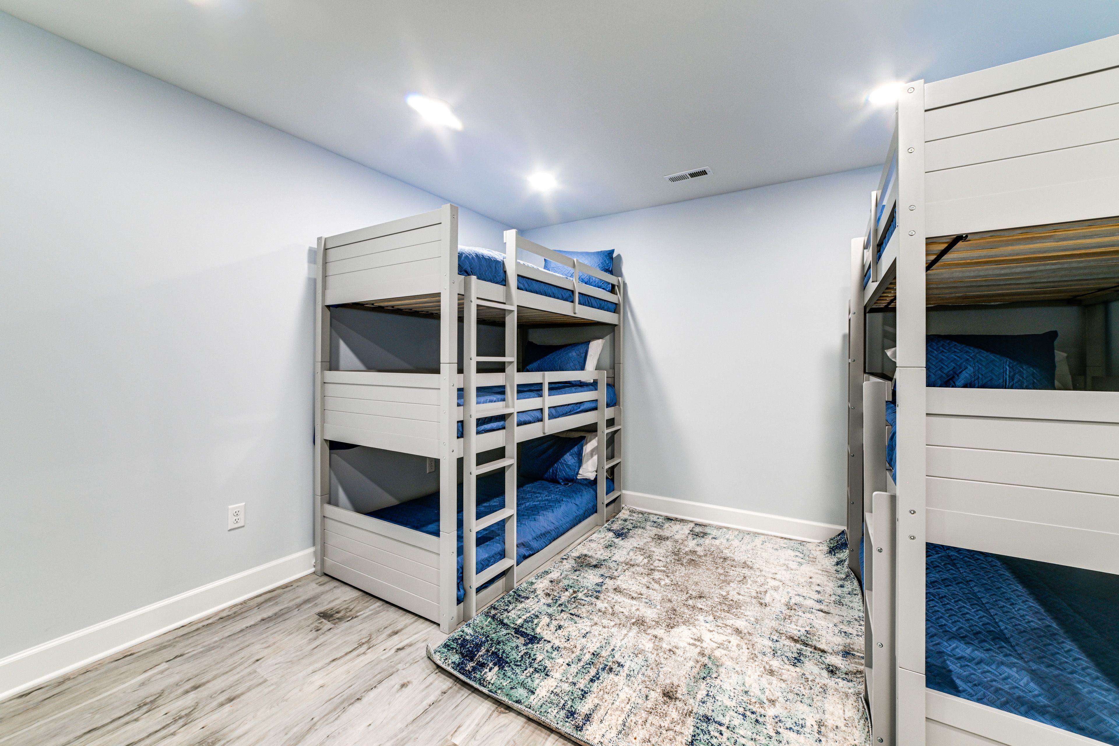 Sleeping Nook | Lower Floor | 2 Twin Triple Bunk Beds