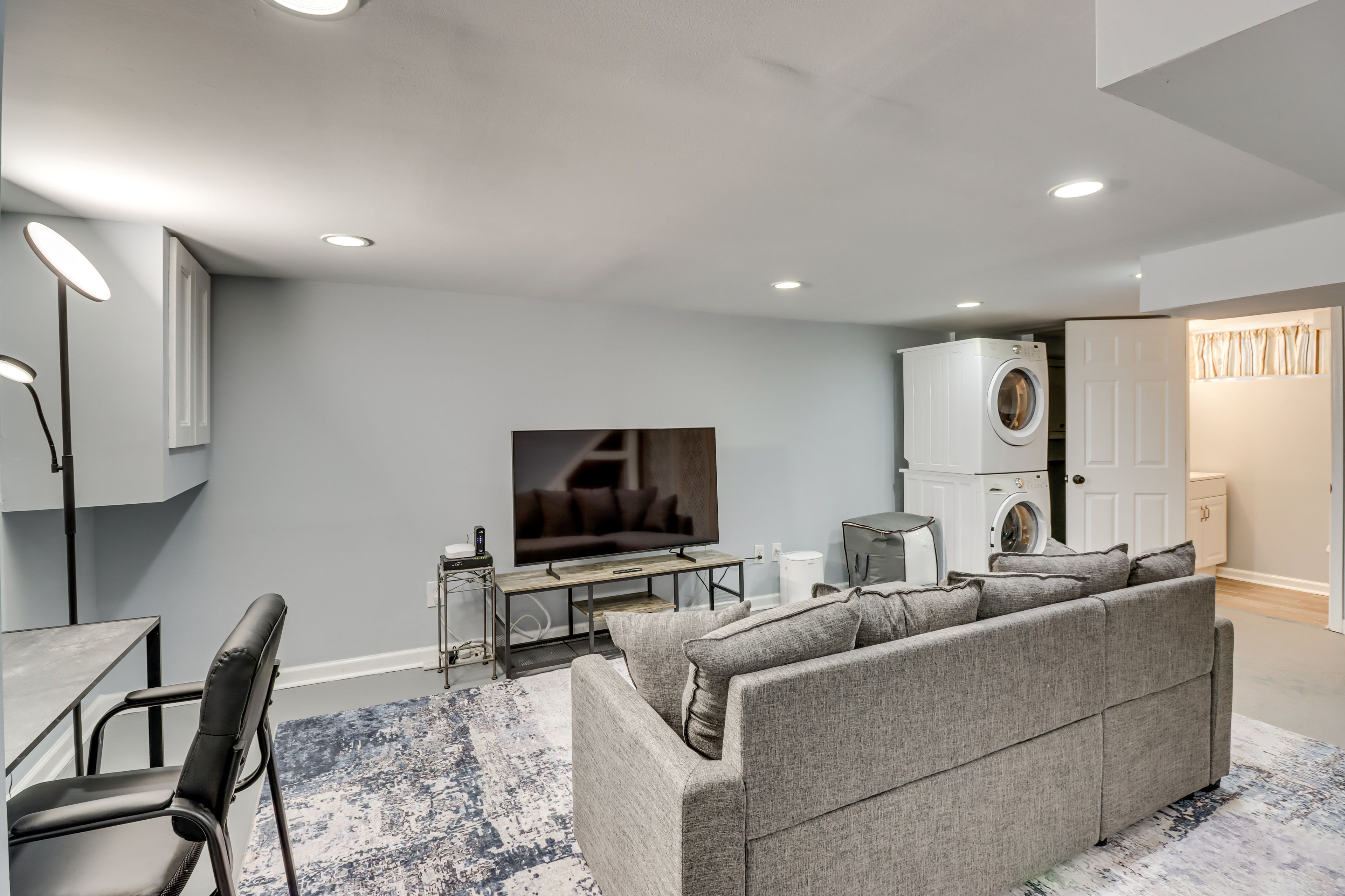 Den | Sleeper Sofa | Workspace | Washer & Dryer | Basement