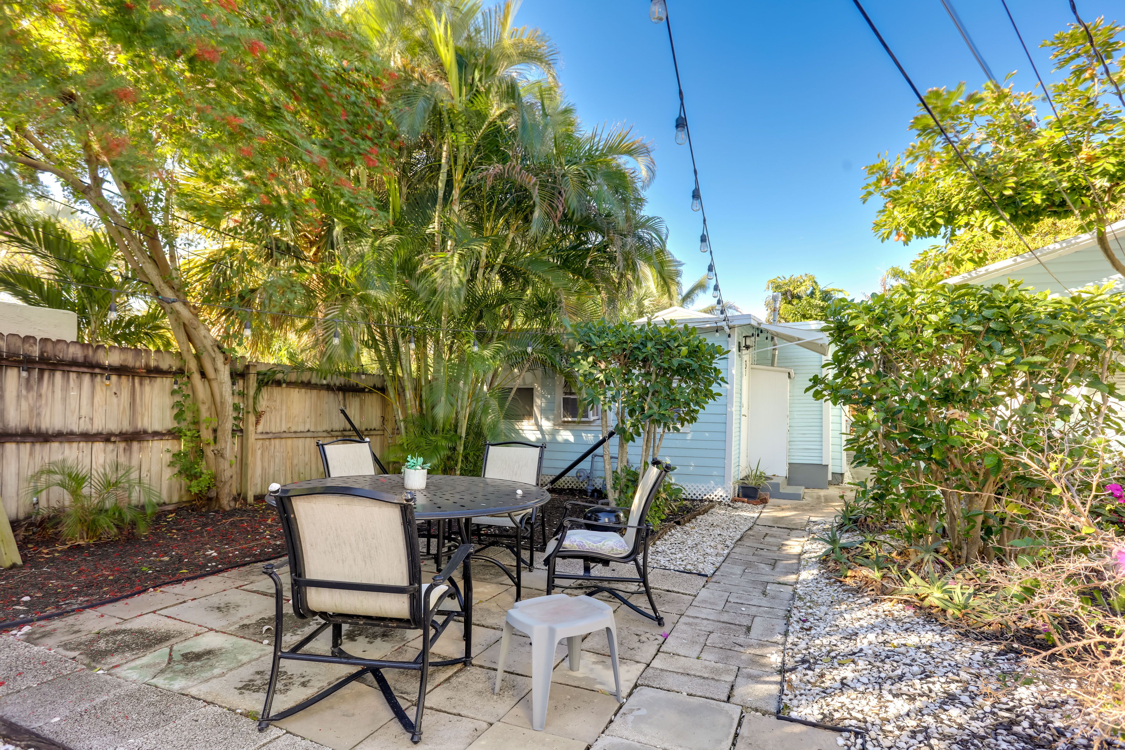Shared Backyard | Charcoal Grill | Outdoor Dining Areas