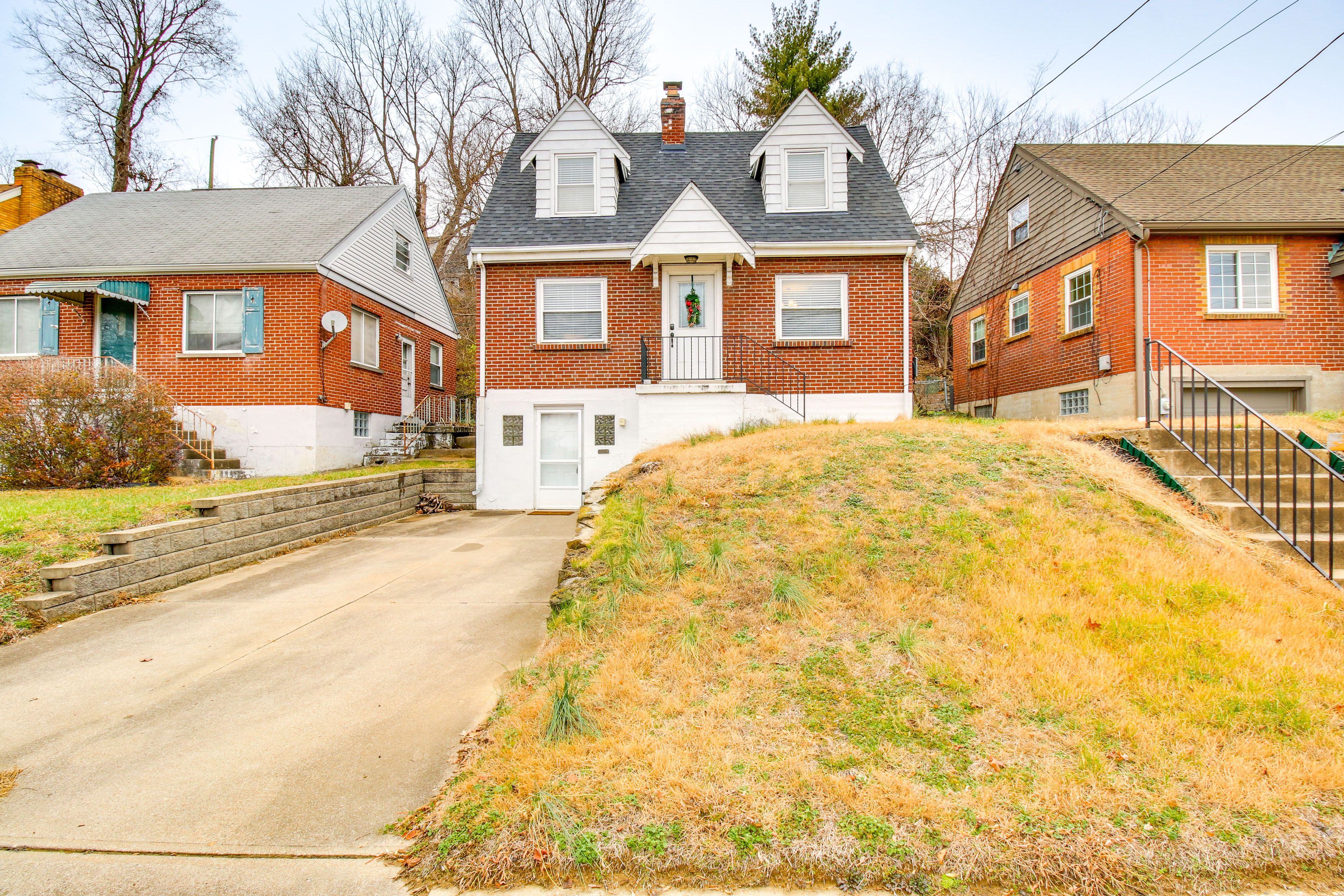 Home Exterior | Parking | Driveway (2 Vehicles) | Street Parking