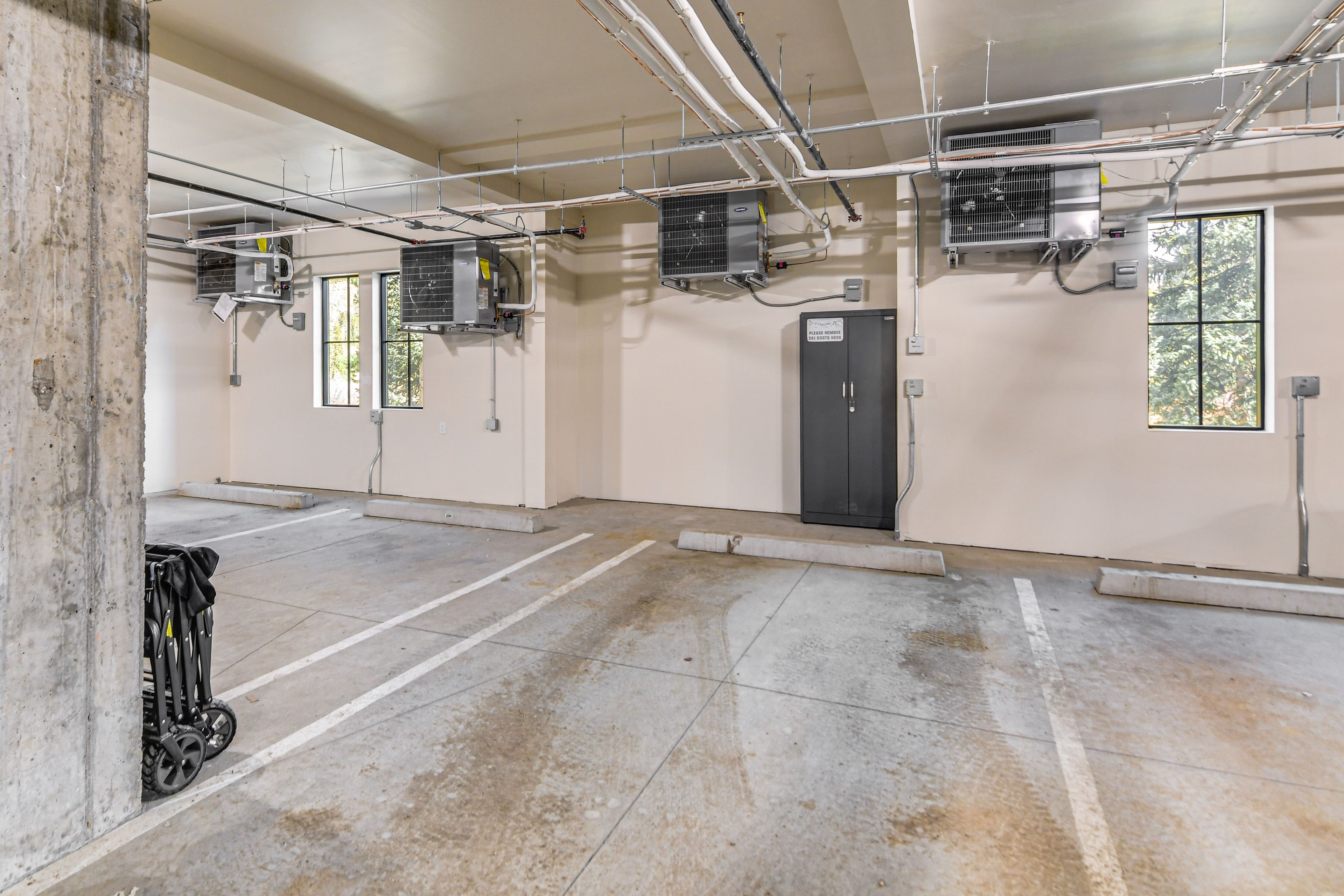 Parking | Community Heated Garage (1 Vehicle) | Outdoor Parking Lot