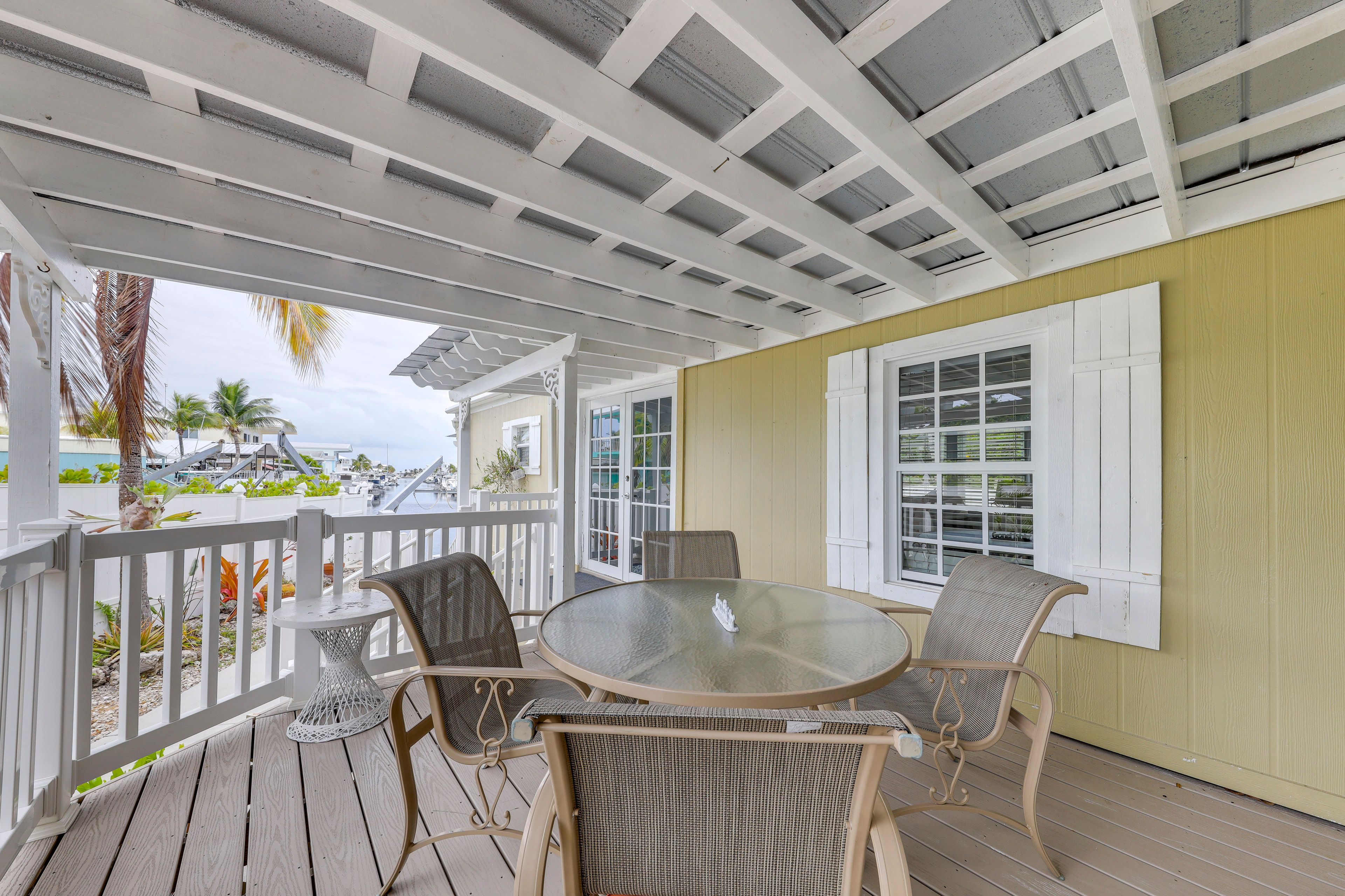 Covered Deck | Outdoor Dining Areas | Water View