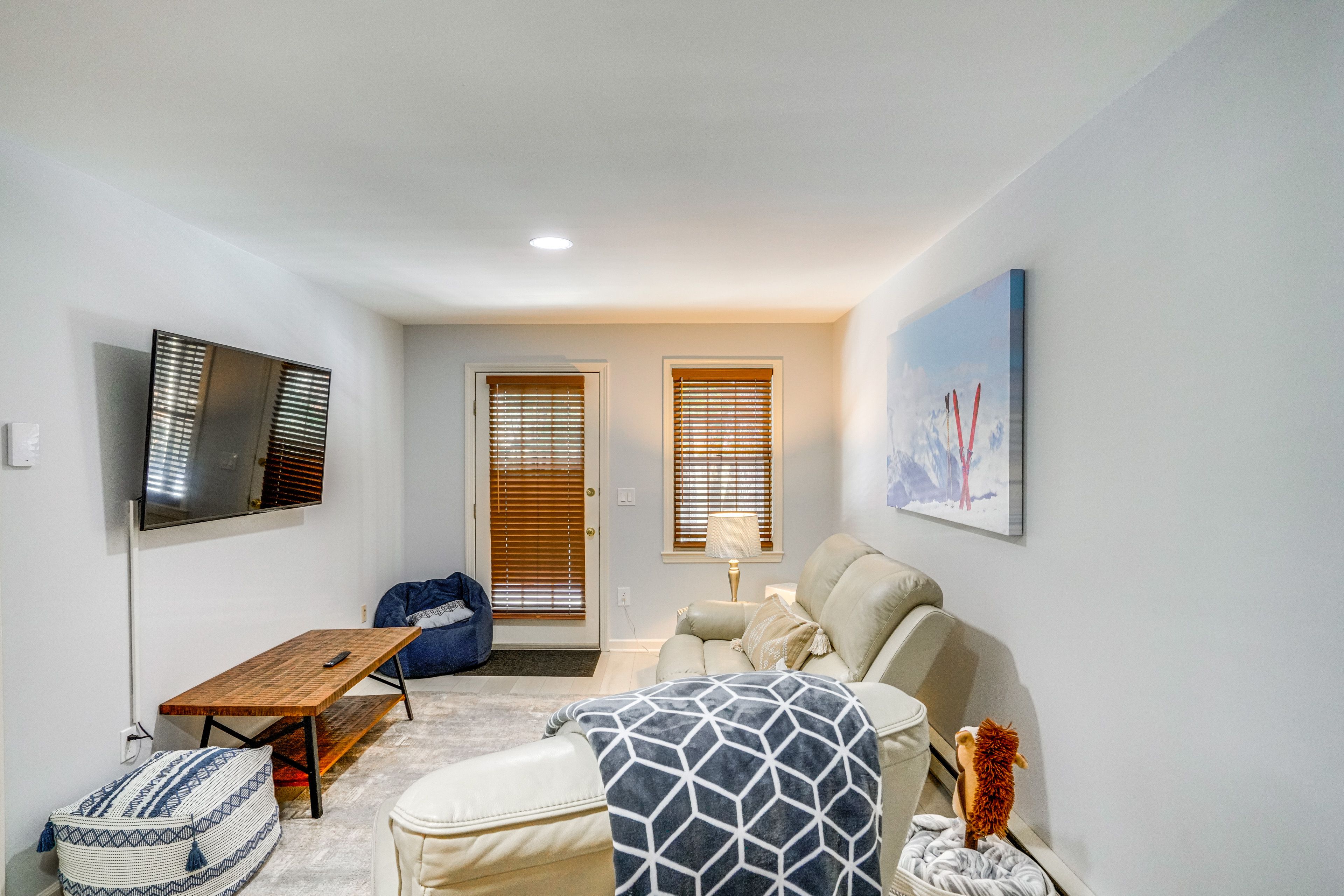 Basement Living Room | Queen Air Mattress | Board Games