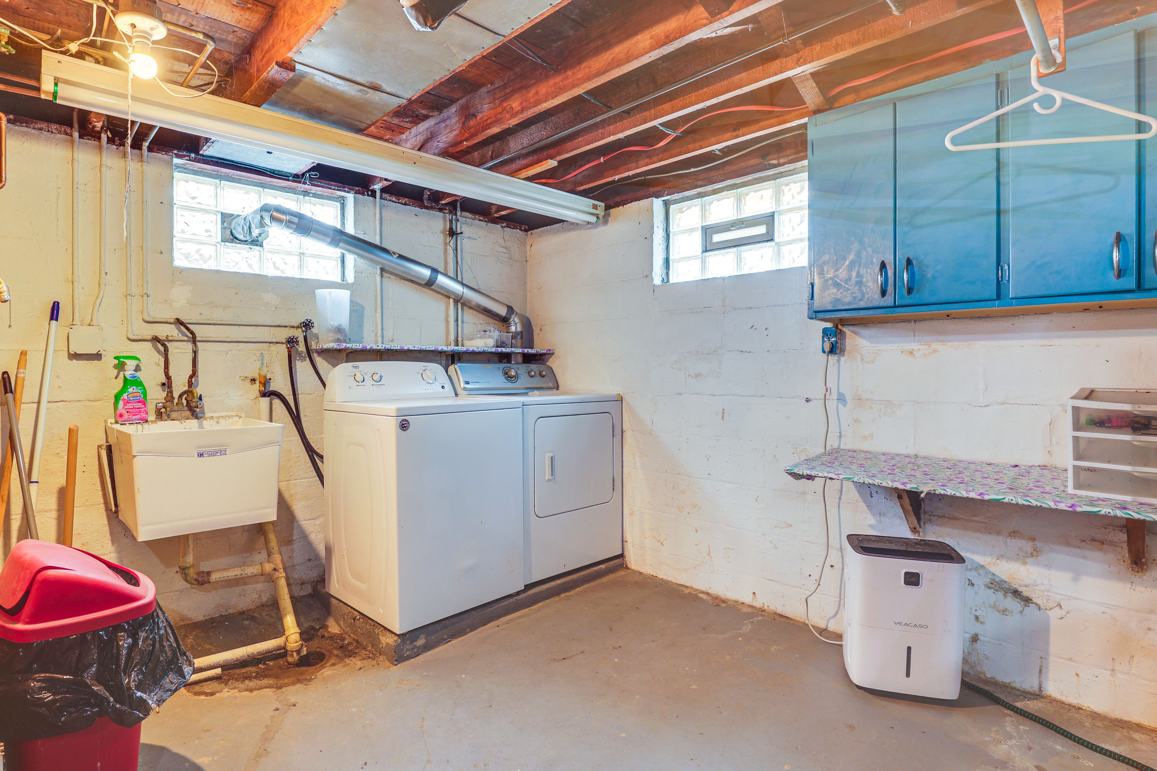 Laundry Area | Basement | Washer/Dryer | Hangers