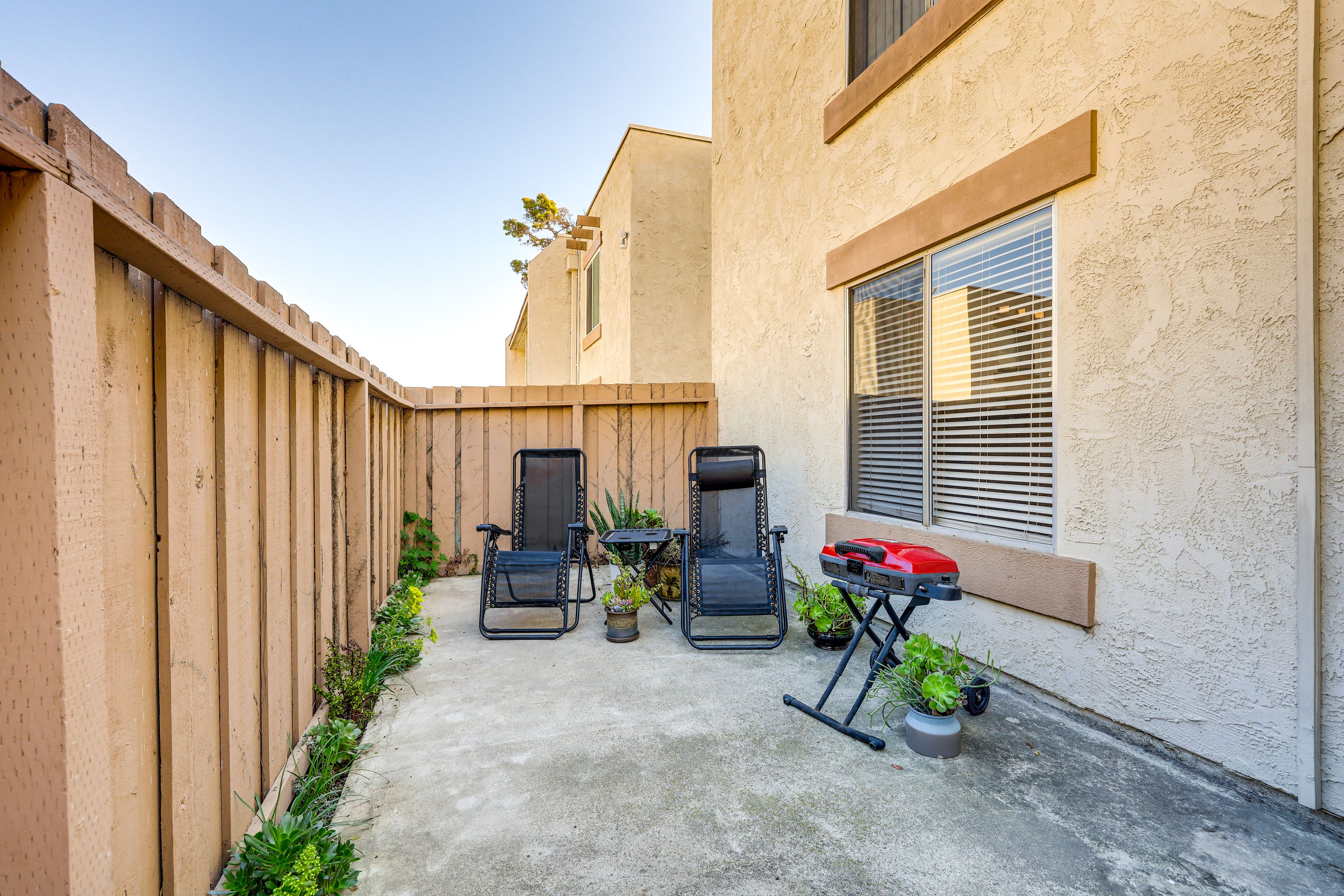 Private Patio | Surrounding Fence | Gas Grill | Lounge Seating