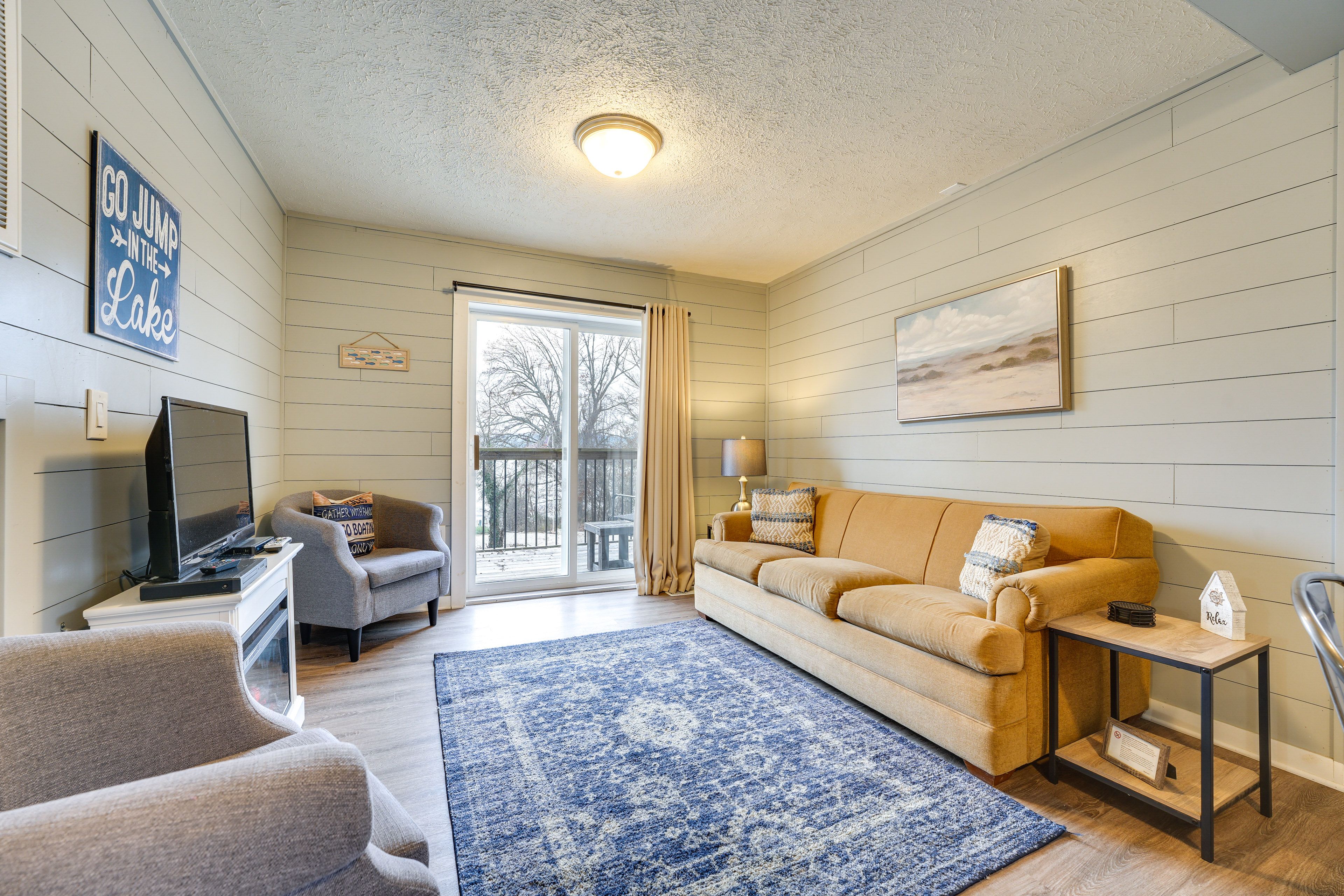 Living Room | Sleeper Sofa | Smart TV | Electric Fireplace | Balcony Access