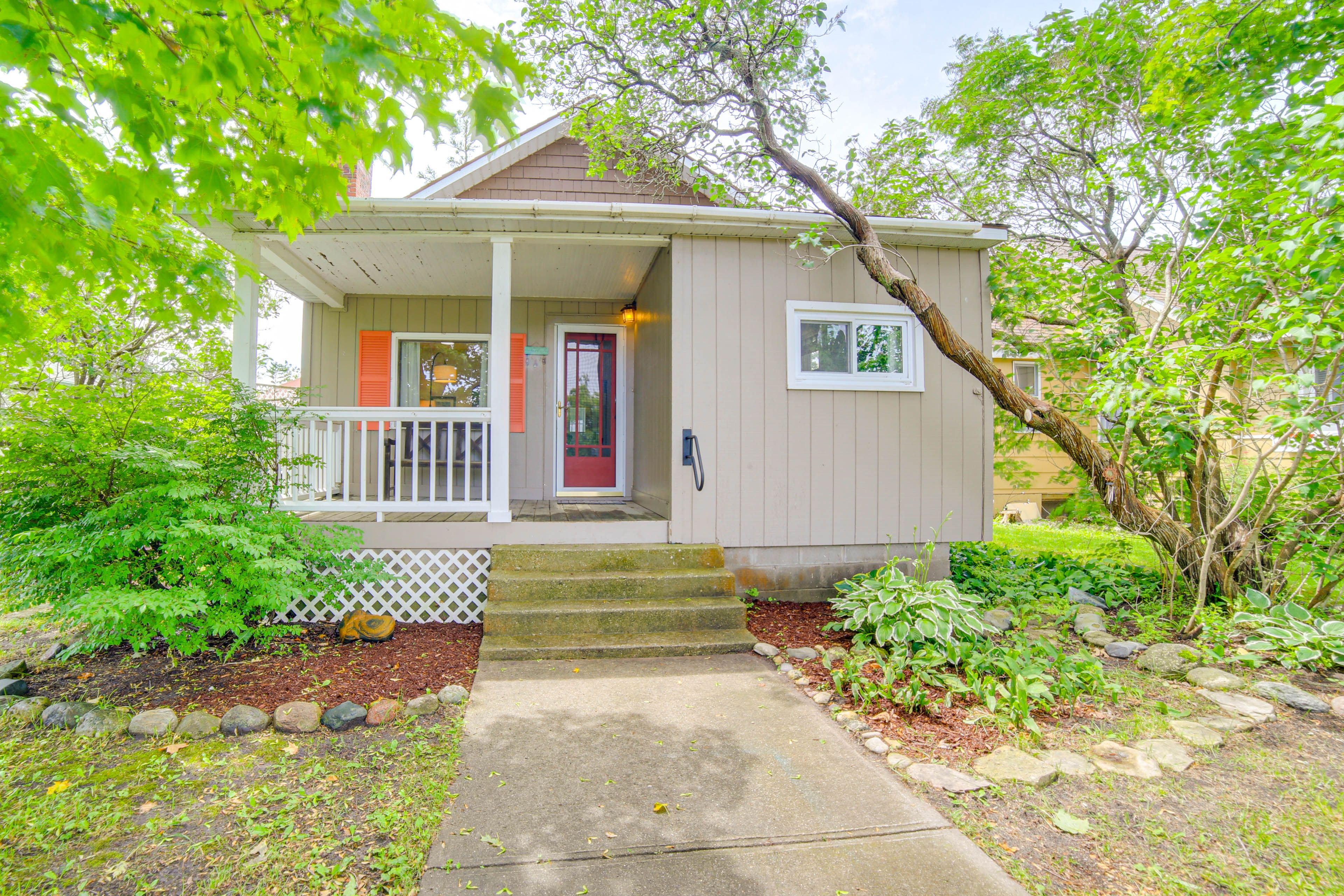 Property Exterior | Covered Porch w/ Seating | Private Yard