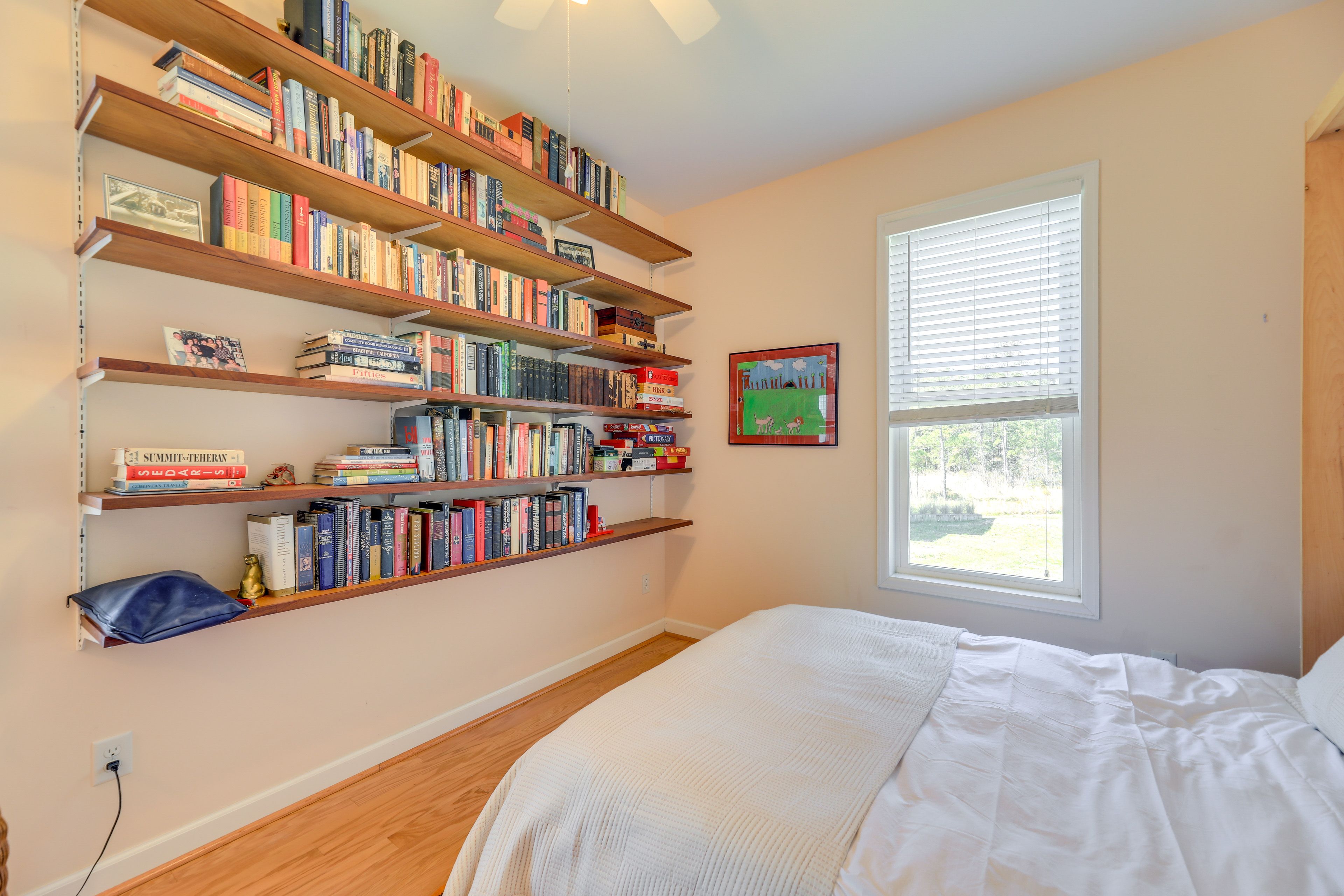 Bedroom 2 | Queen Murphy Bed | 1st Level | Books