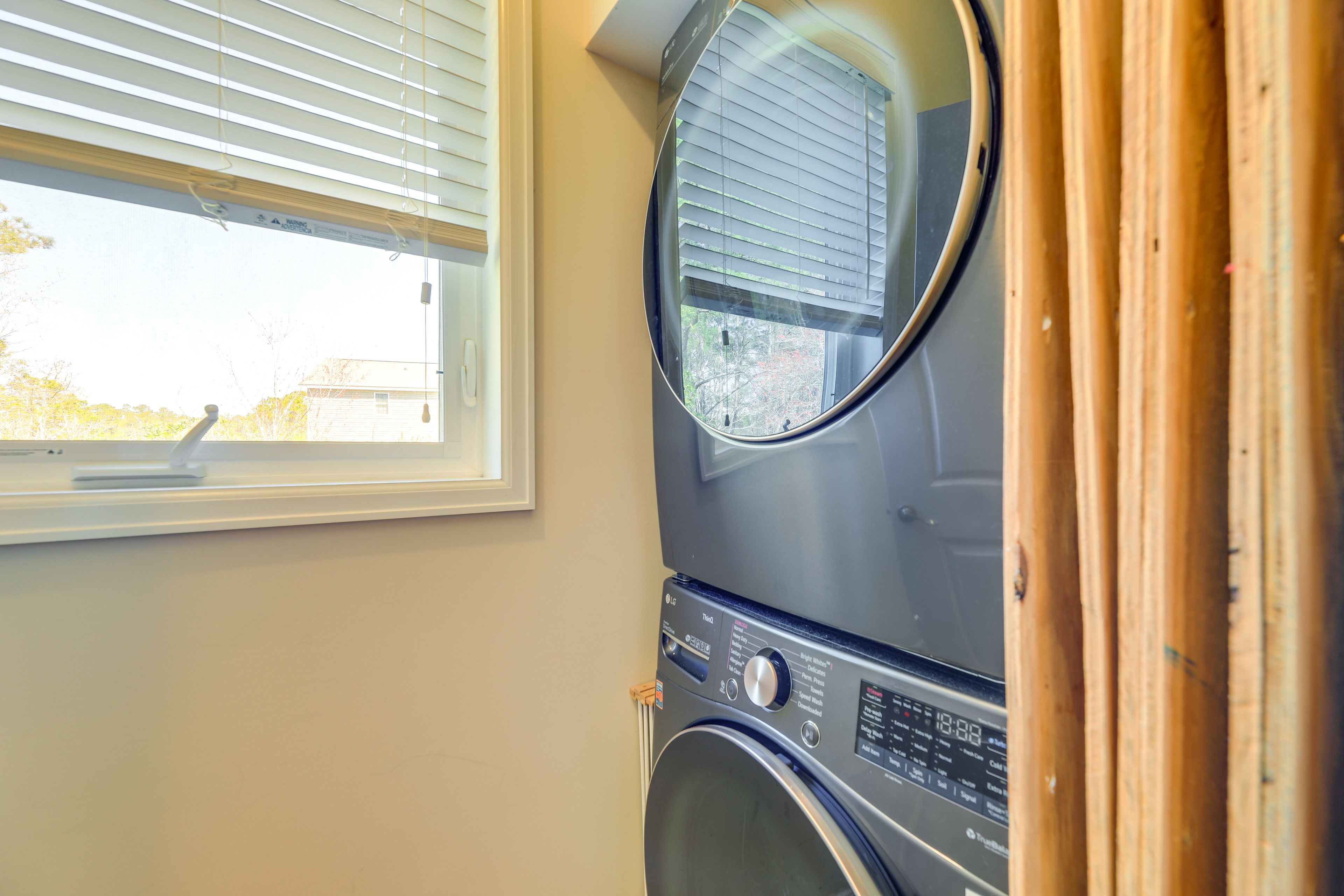 Laundry Area | 1st Level | Washer/Dryer | Laundry Detergent | Iron/Board